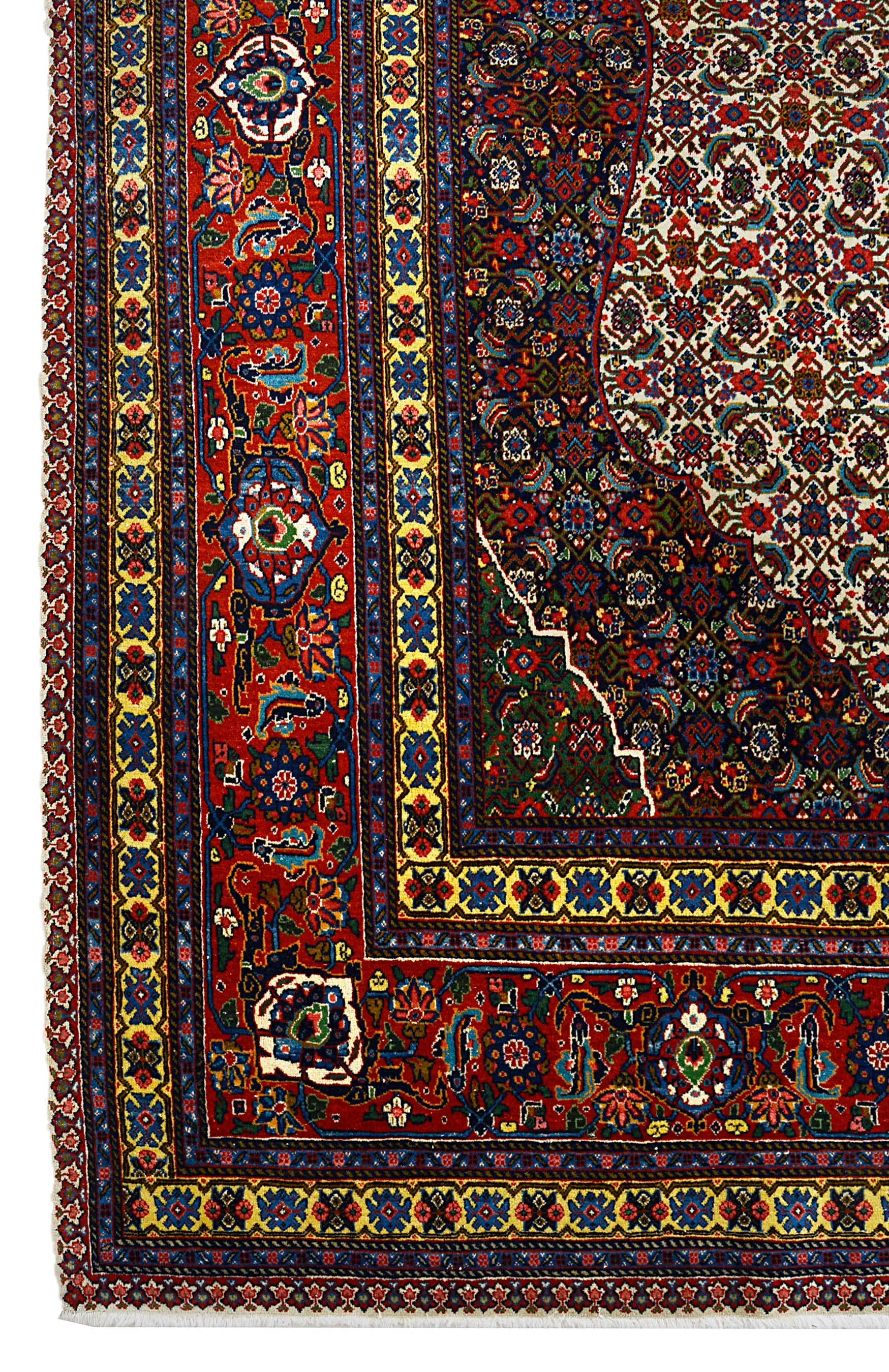 Vintage Persian Tabriz carpet corner detail showing fine hand-knotted wool and decorative border
