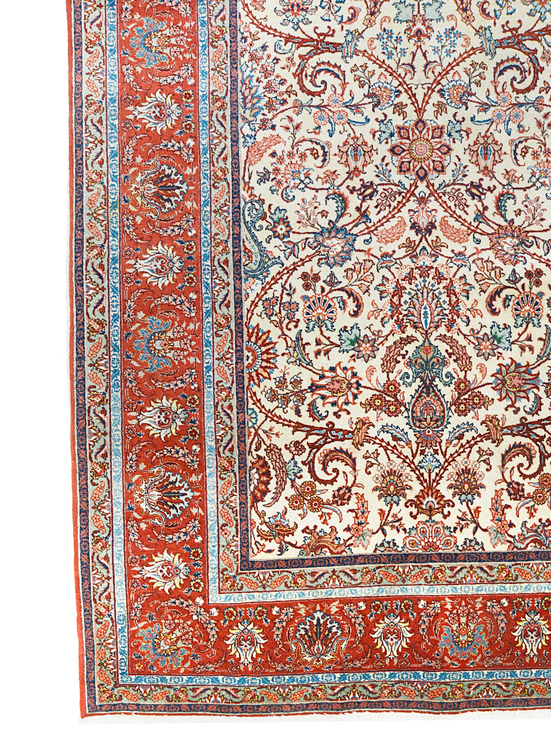 Fine antique Persian Tabriz rug corner detail showing hand-knotted wool and intricate floral border
