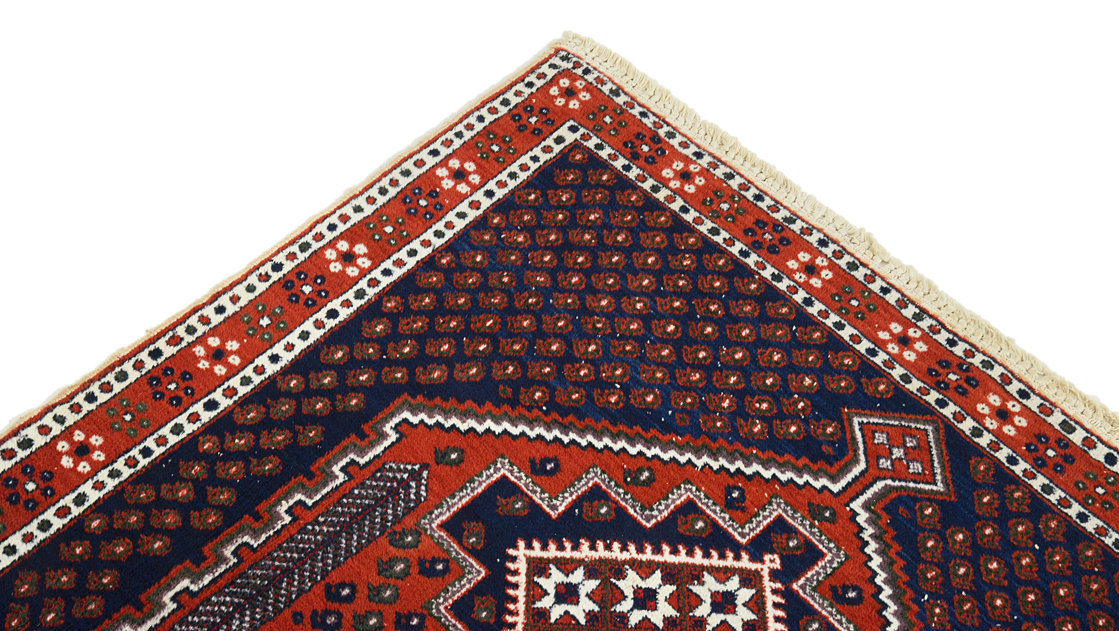 Close-up of a corner motif on an antique Persian Afshar rug
