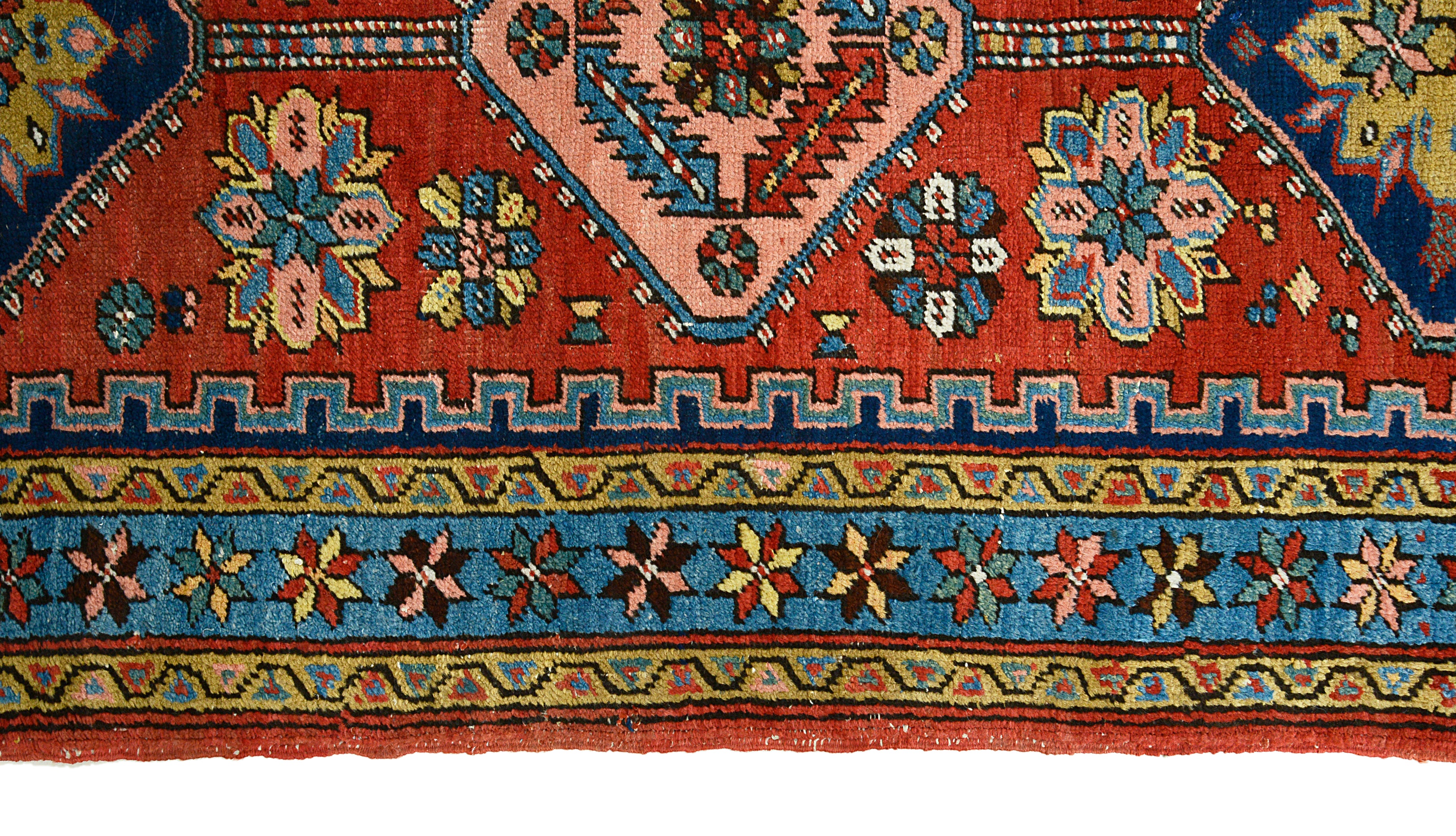 Border detail of an antique Persian Heriz runner
