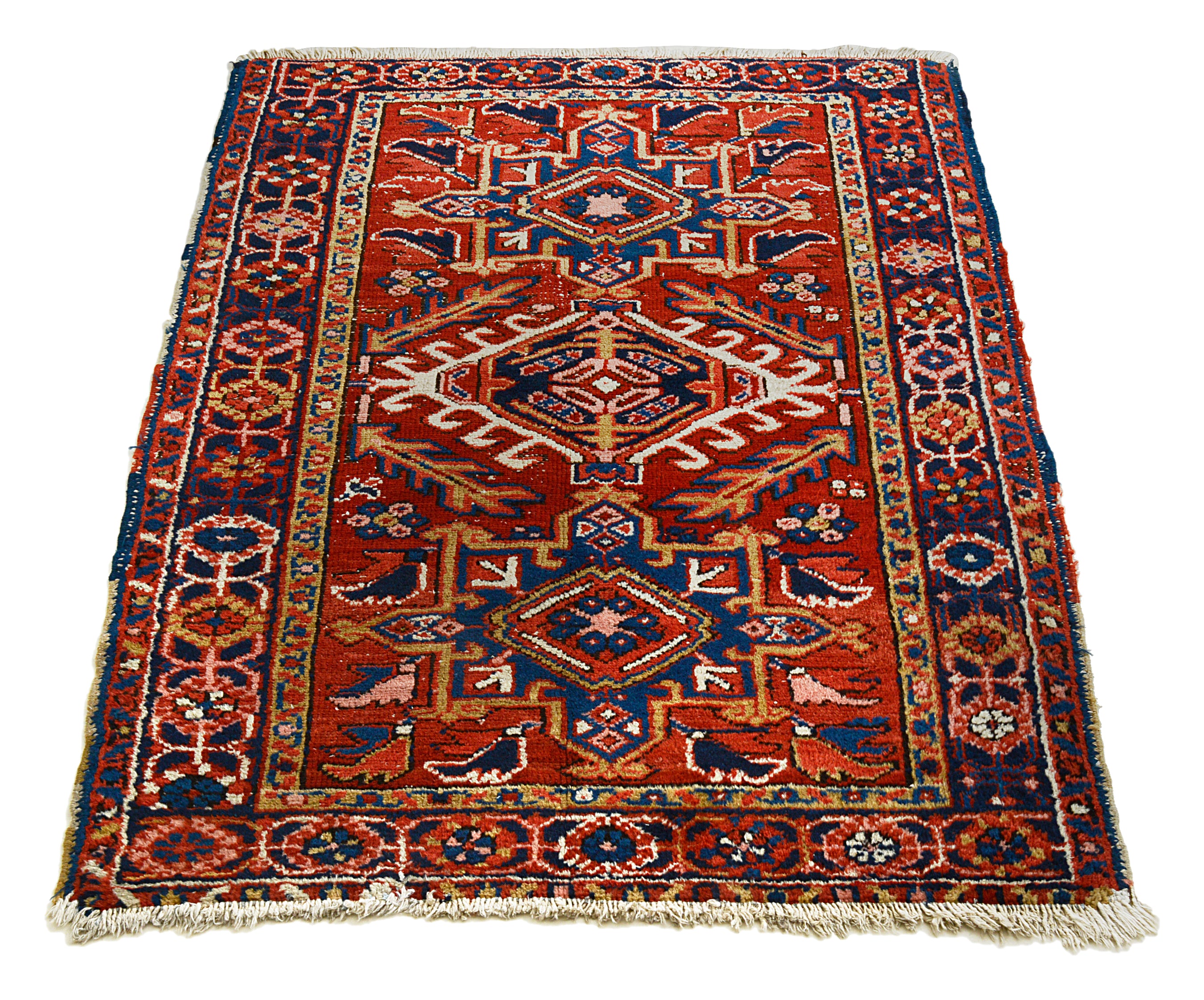Full view of an antique Persian Heriz rug woven circa 1930, measuring 130 x 96 cm