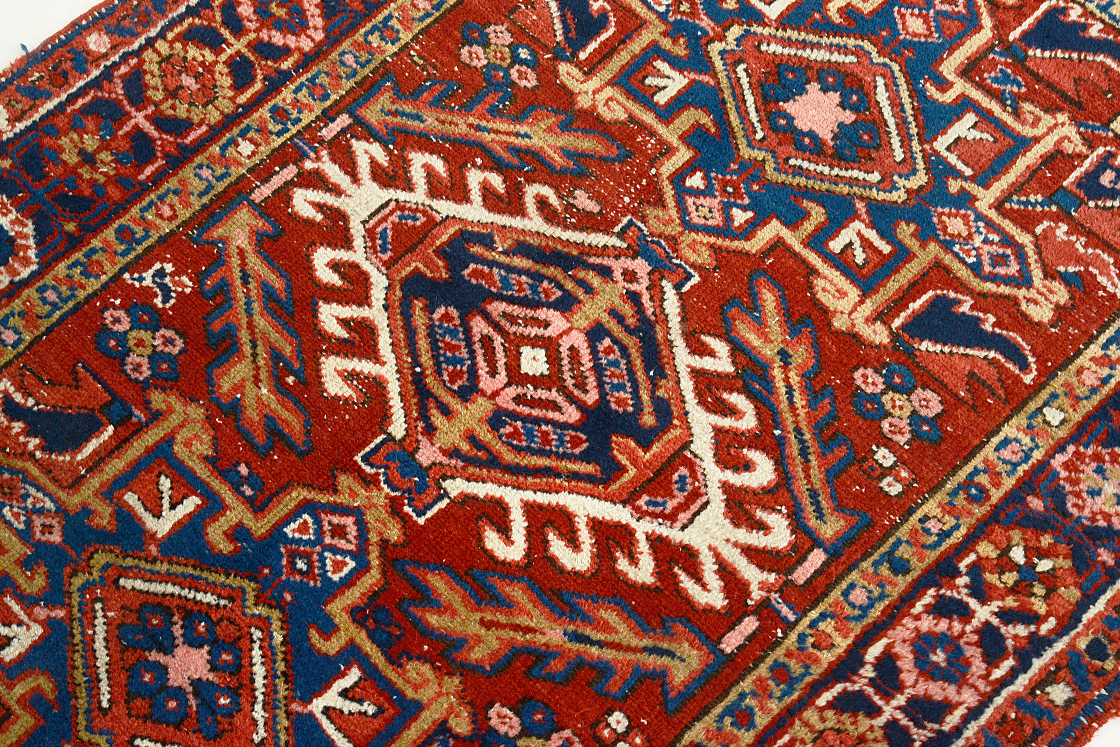 Close-up of the central field design on an antique Persian Heriz rug

