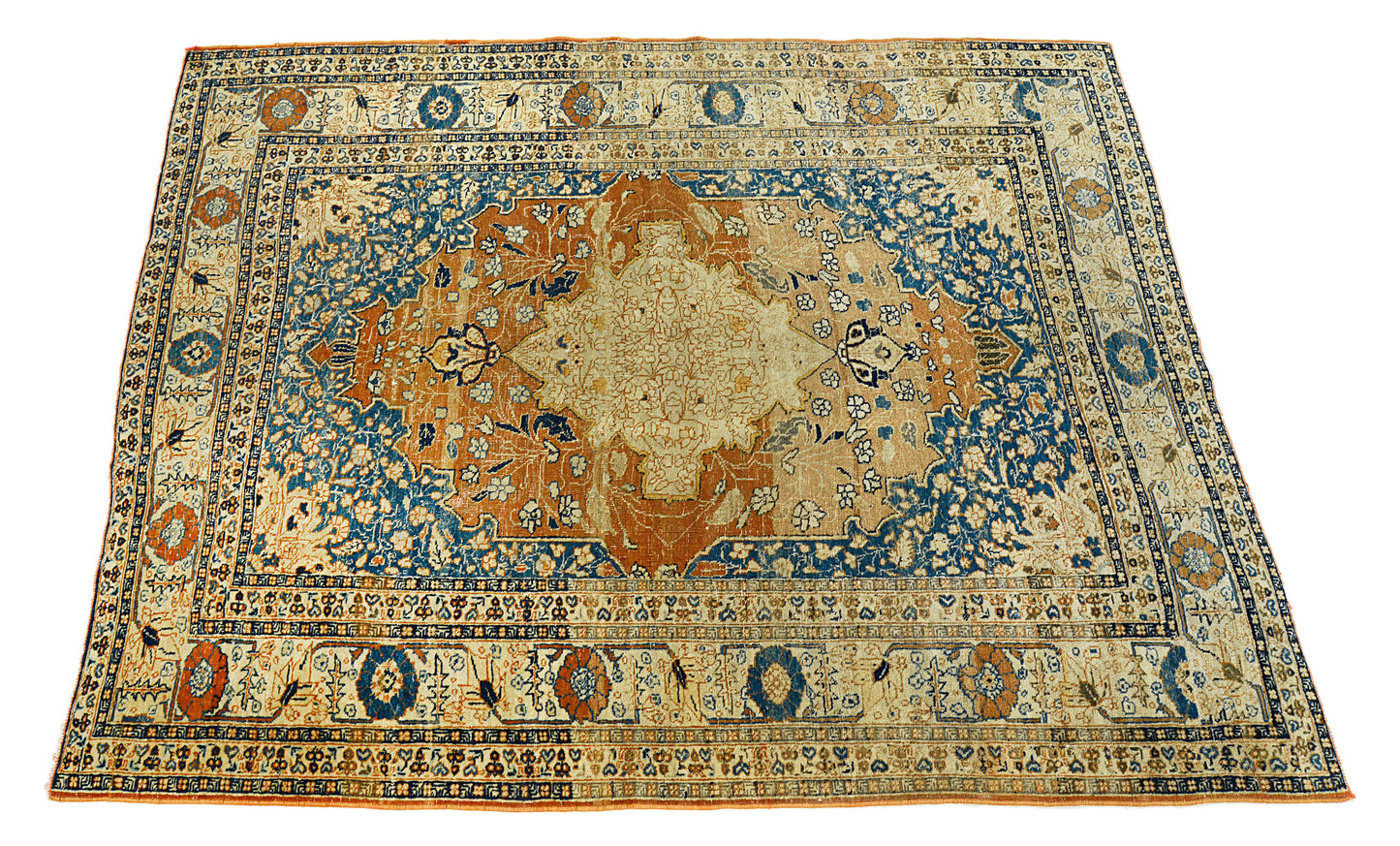 Central medallion detail on antique Persian Tabriz rug