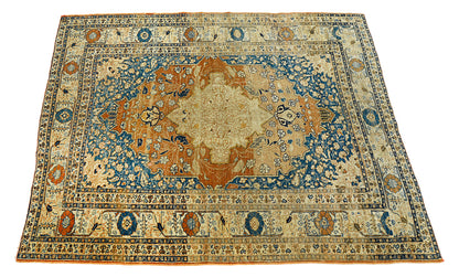 Central medallion detail on antique Persian Tabriz rug