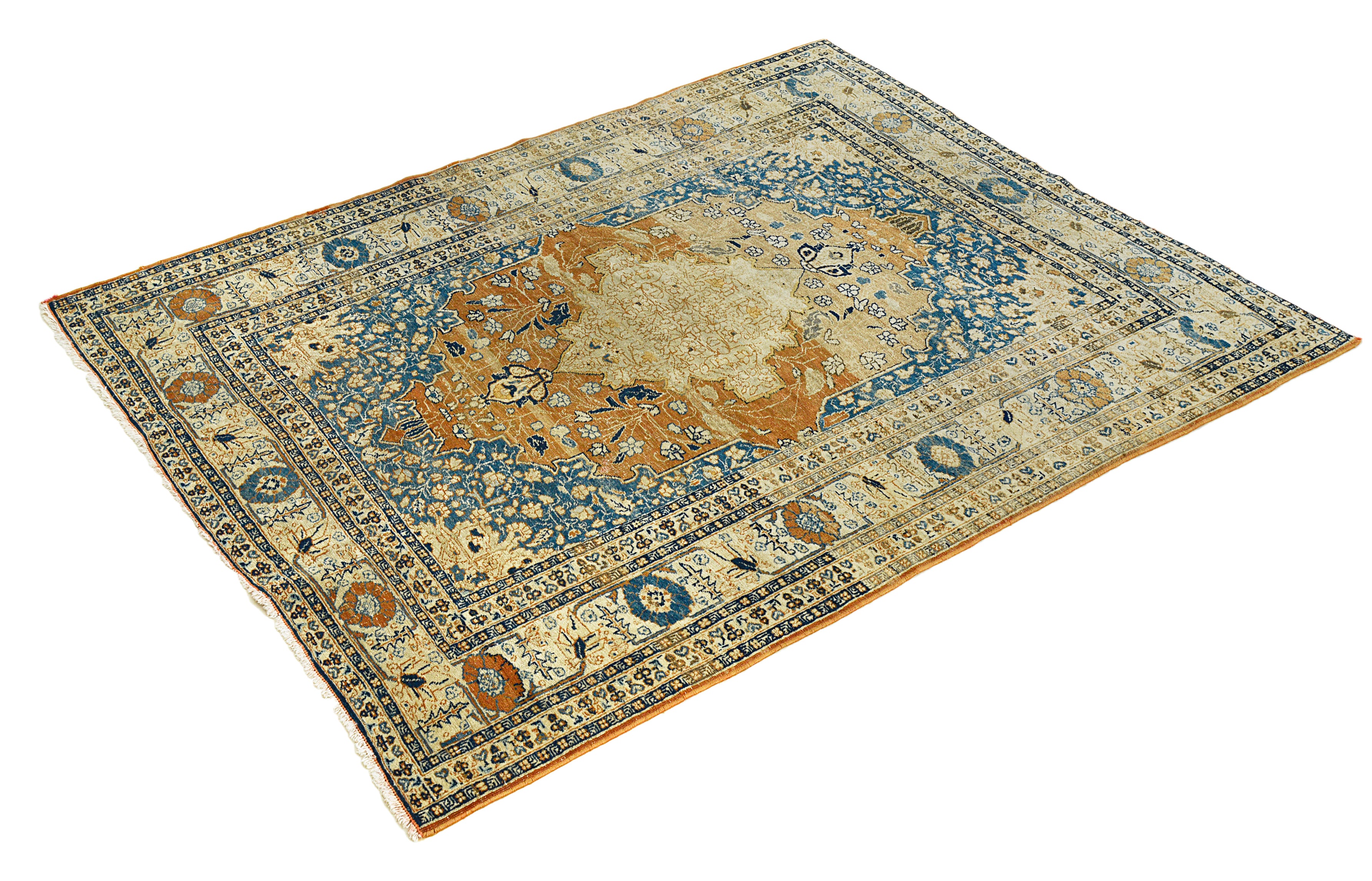 Close-up of the central field design on an antique Persian Tabriz rug