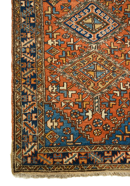 Geometric pattern detail on antique Persian Heriz rug