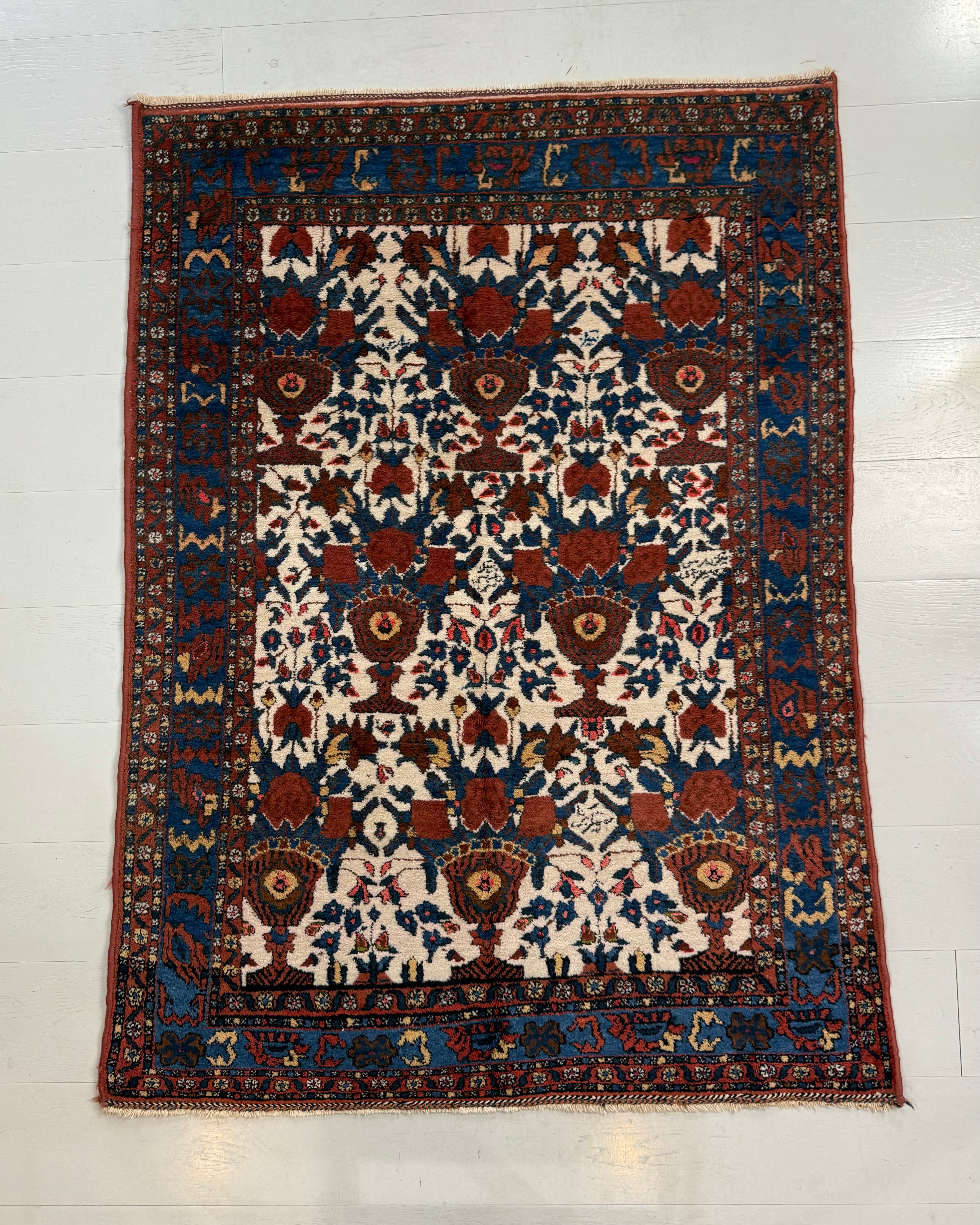 Full view of antique Persian Afshar rug with traditional tribal design
