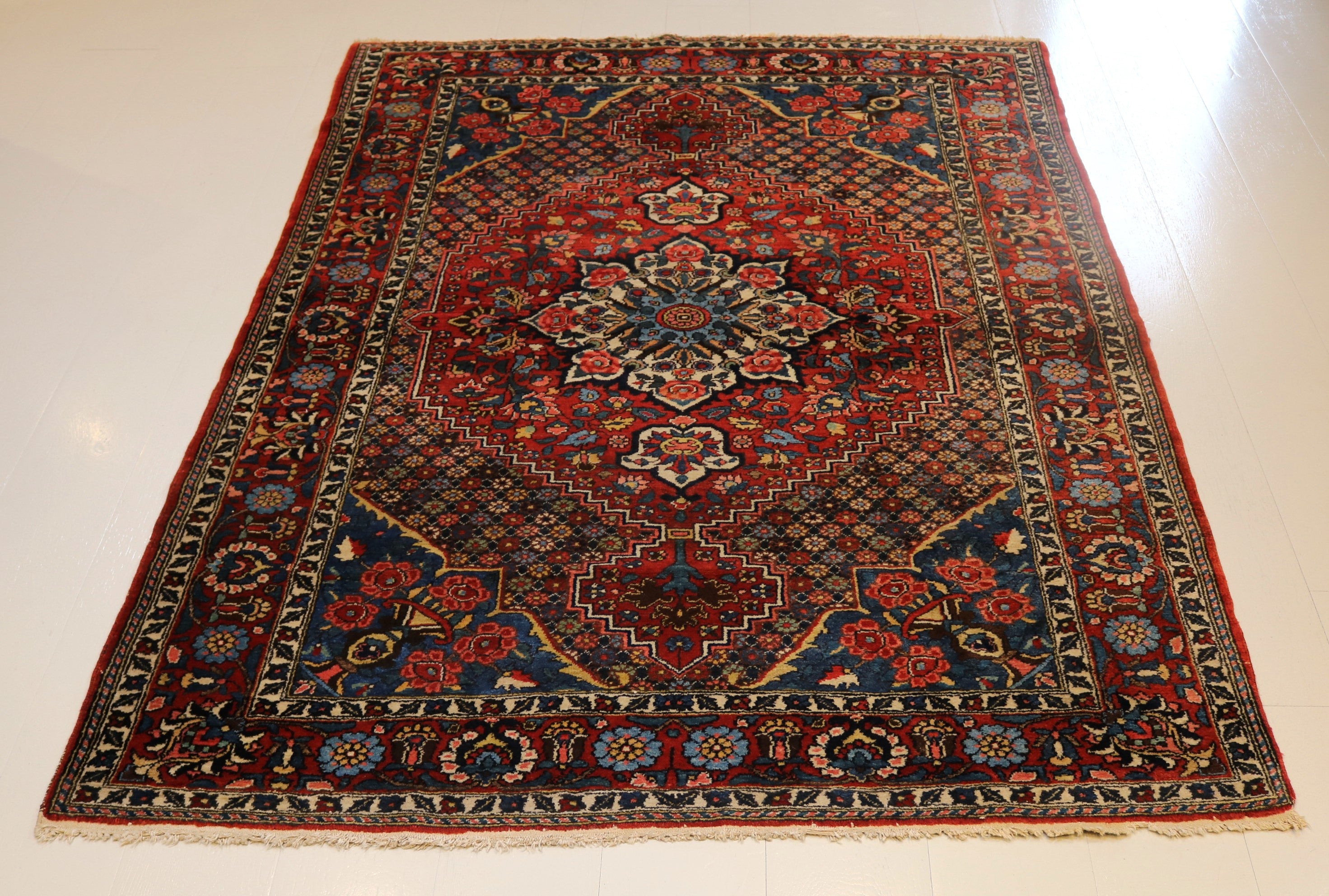 Antique Persian Bakhtiyar Rug with Light Blue Corners, 197 × 144 cm