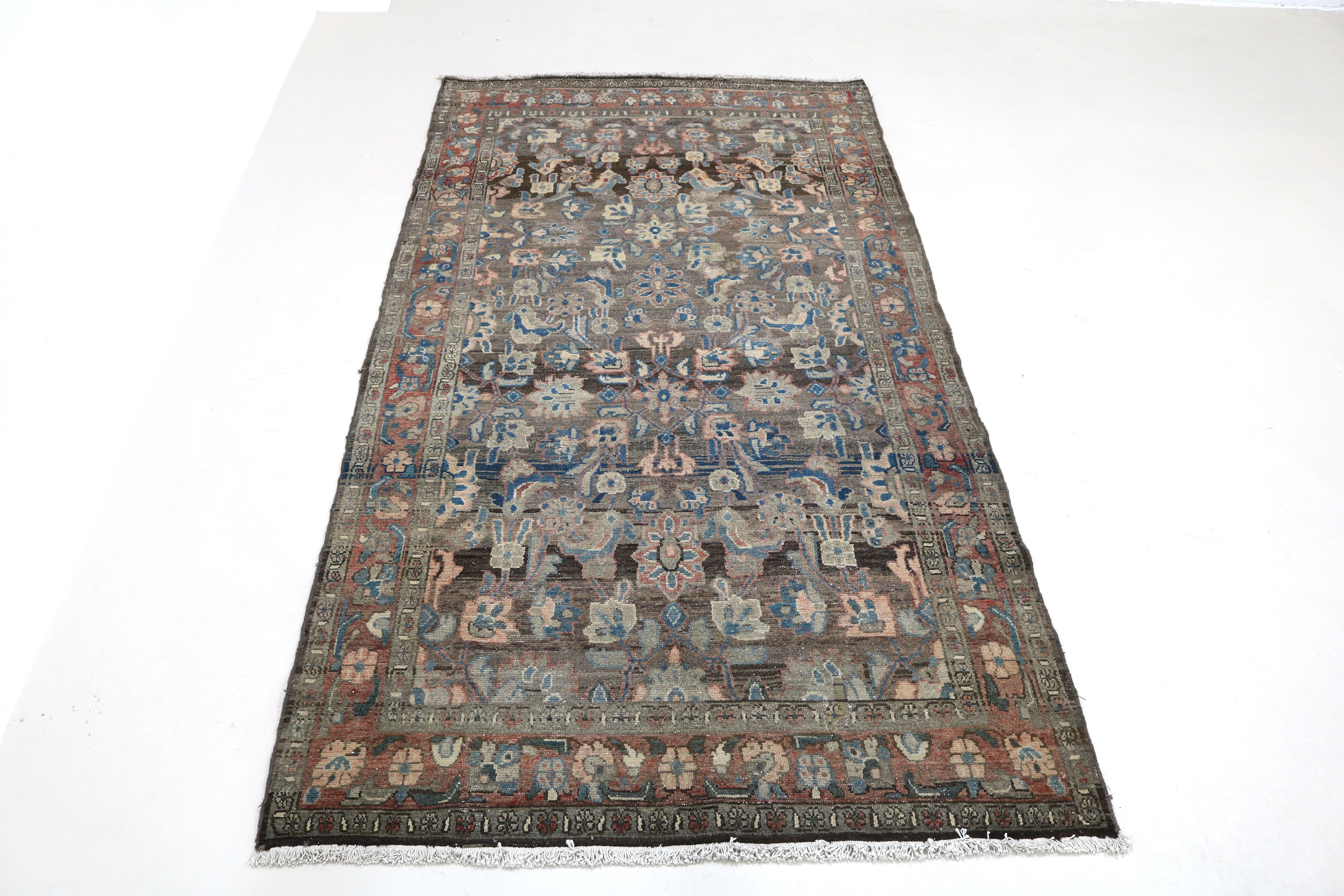 Full view of antique Persian Malayer rug with delicate all-over design and harmonious borders
