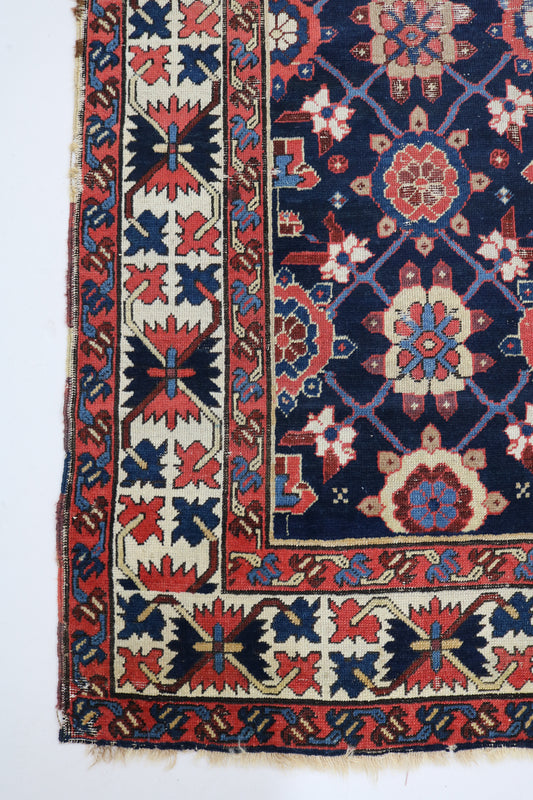 Long view of antique Caucasian Karabag runner showing elongated format and bold floral medallions, 415 × 92 cm
