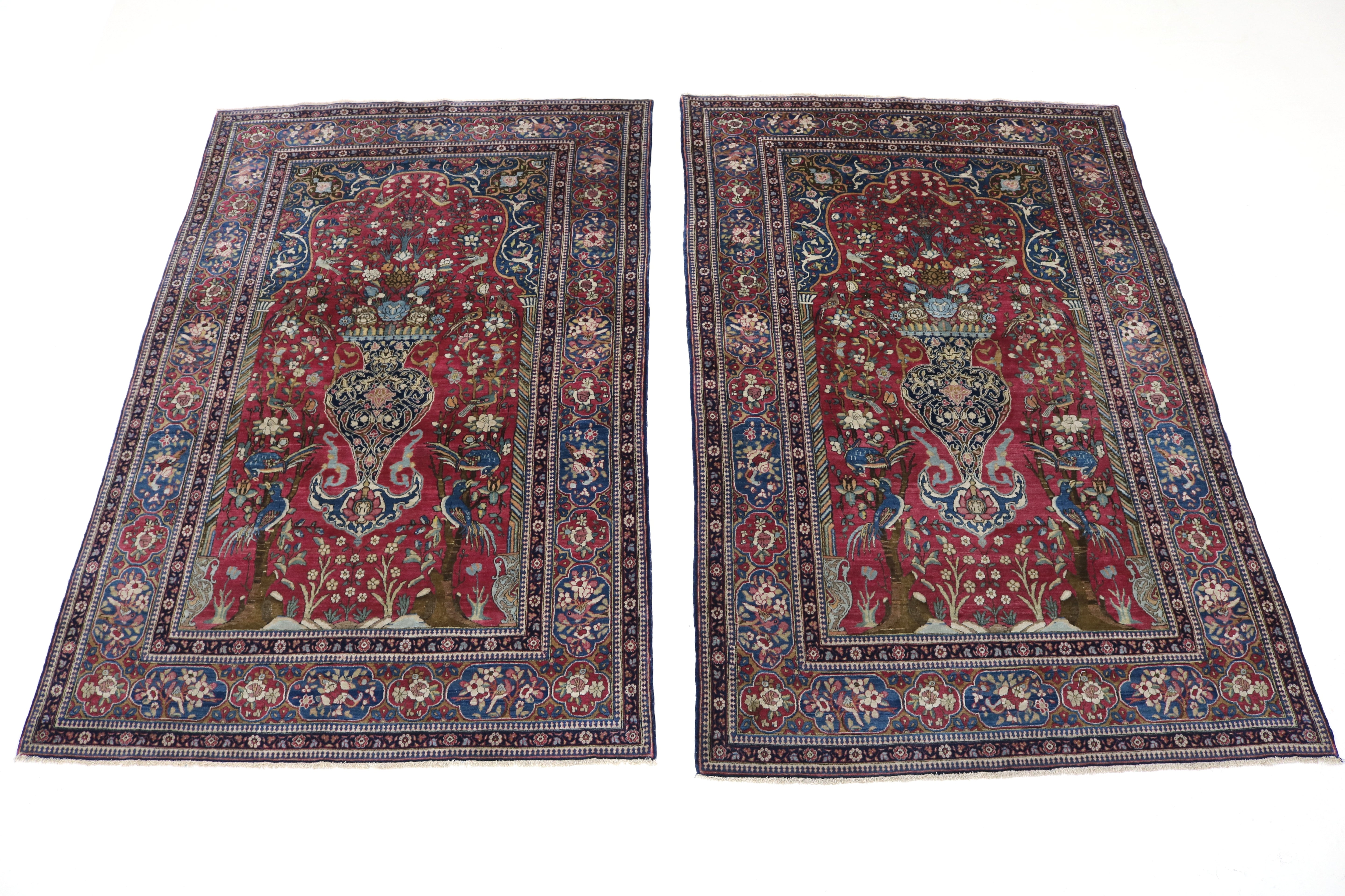 Close-up of finely knotted wool texture on antique Isfahan rug
