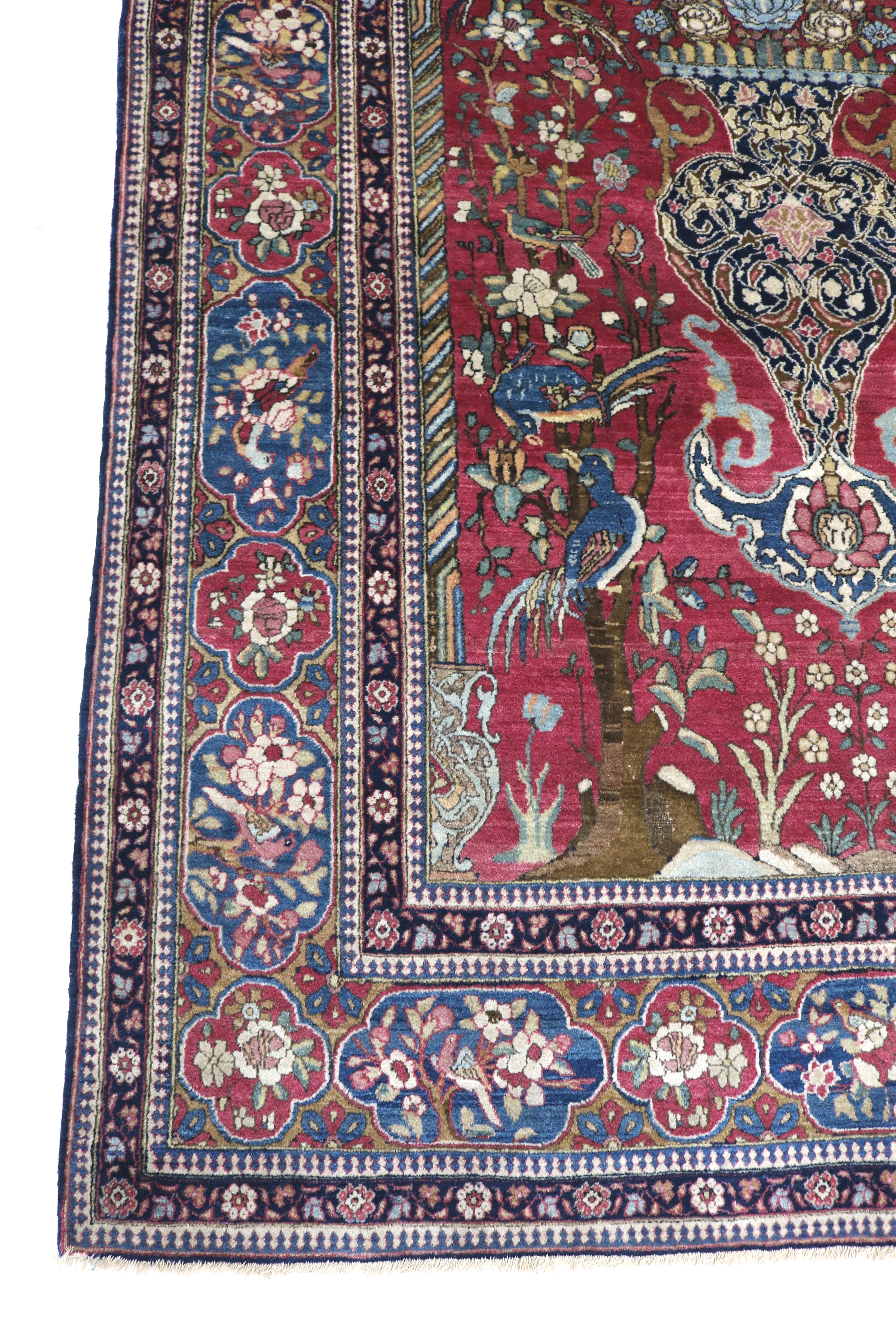 Long view of antique Isfahan rug showing refined proportions and intricate design, 215 × 141 cm
