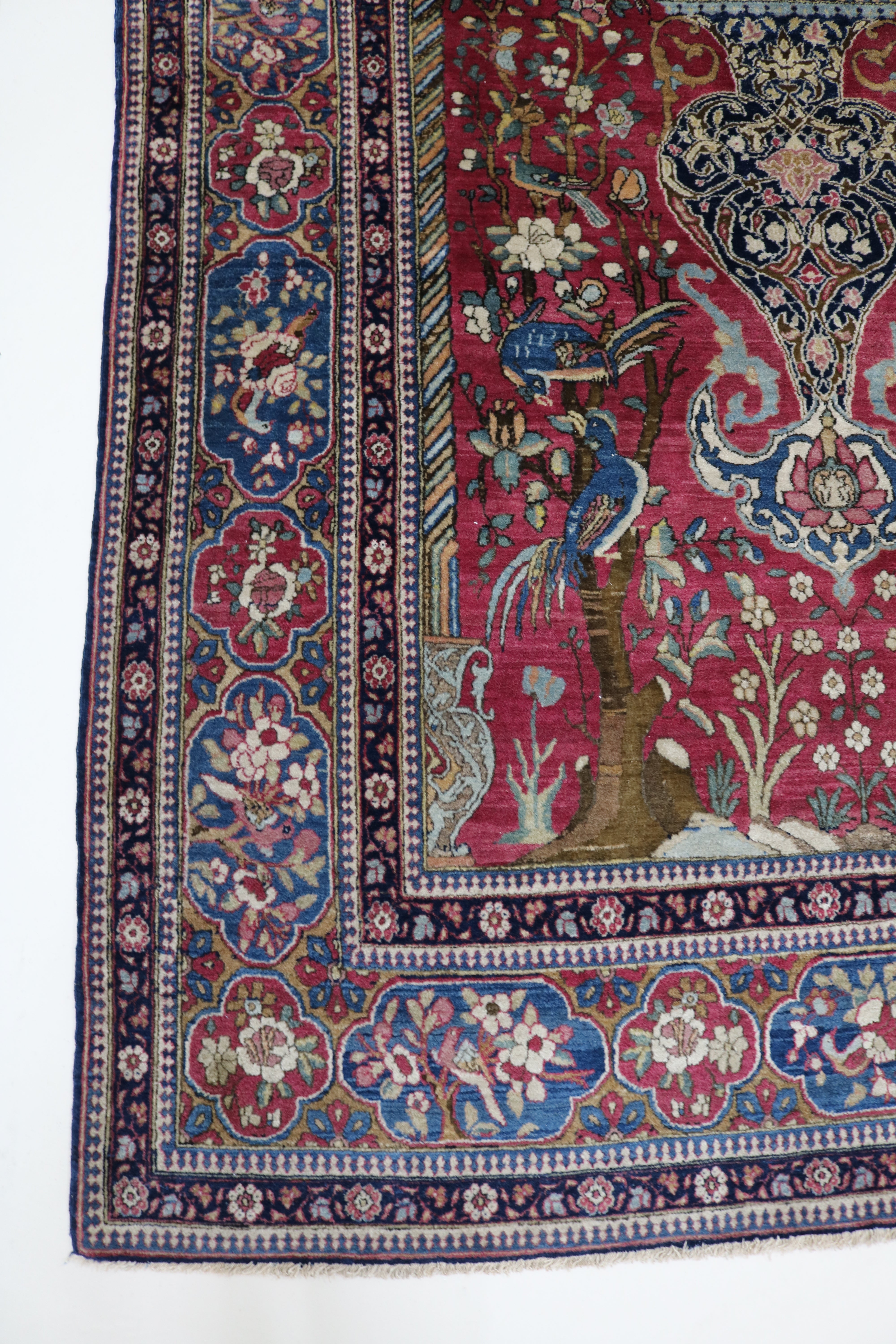 Long view of antique Isfahan rug showing elegant proportions and finely drawn design, 217 × 140 cm
