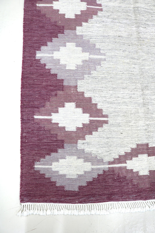 Vintage Swedish Kilim rug, full view, handwoven Scandinavian flatweave with geometric pattern in plum, grey, and ivory, 225 × 170 cm.