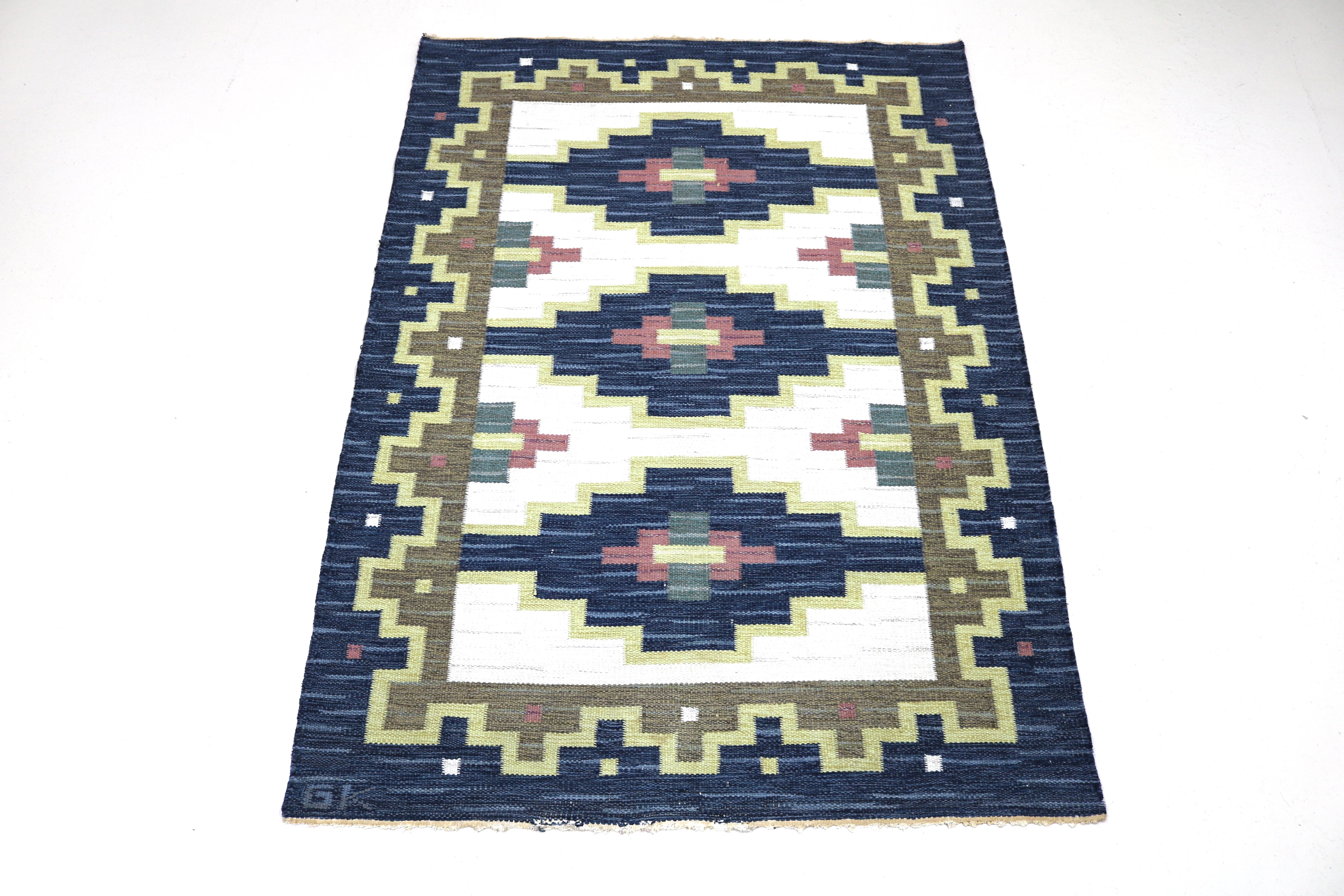 Full view of handwoven vintage Swedish wool flatweave rug from the 1950s–1960s.