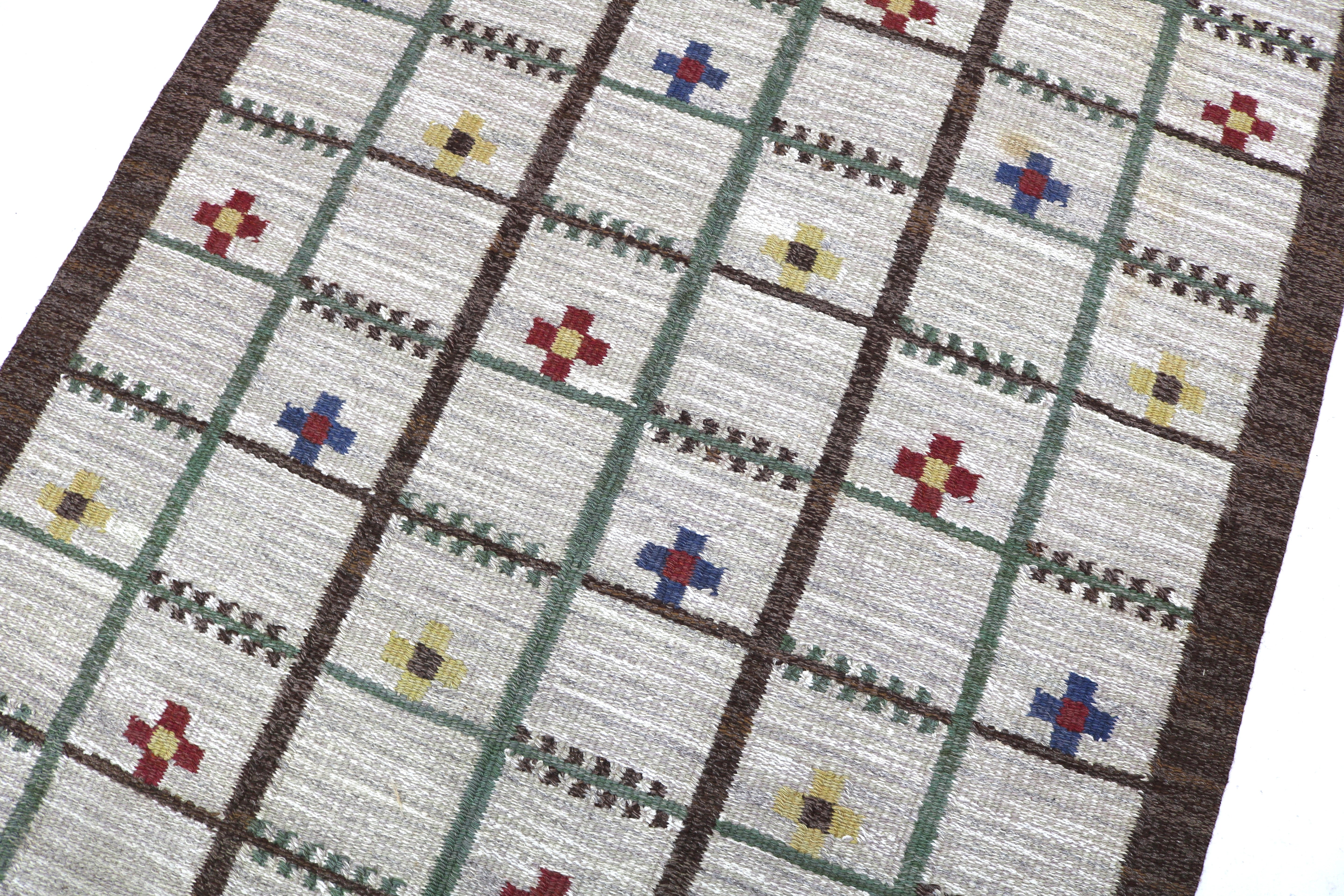 Detail of the handwoven lattice pattern on an authentic Swedish kilim rug.