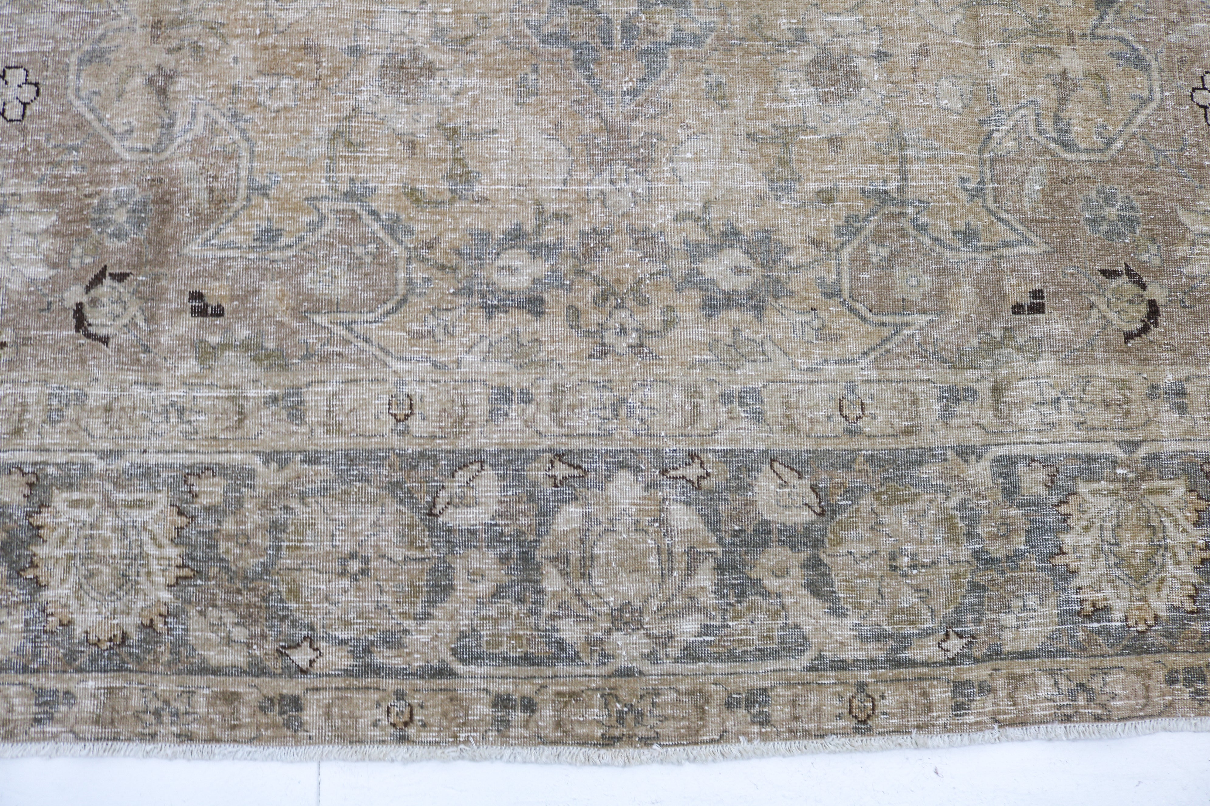 Handwoven Persian Tabriz rug detail with refined craftsmanship and naturally aged character