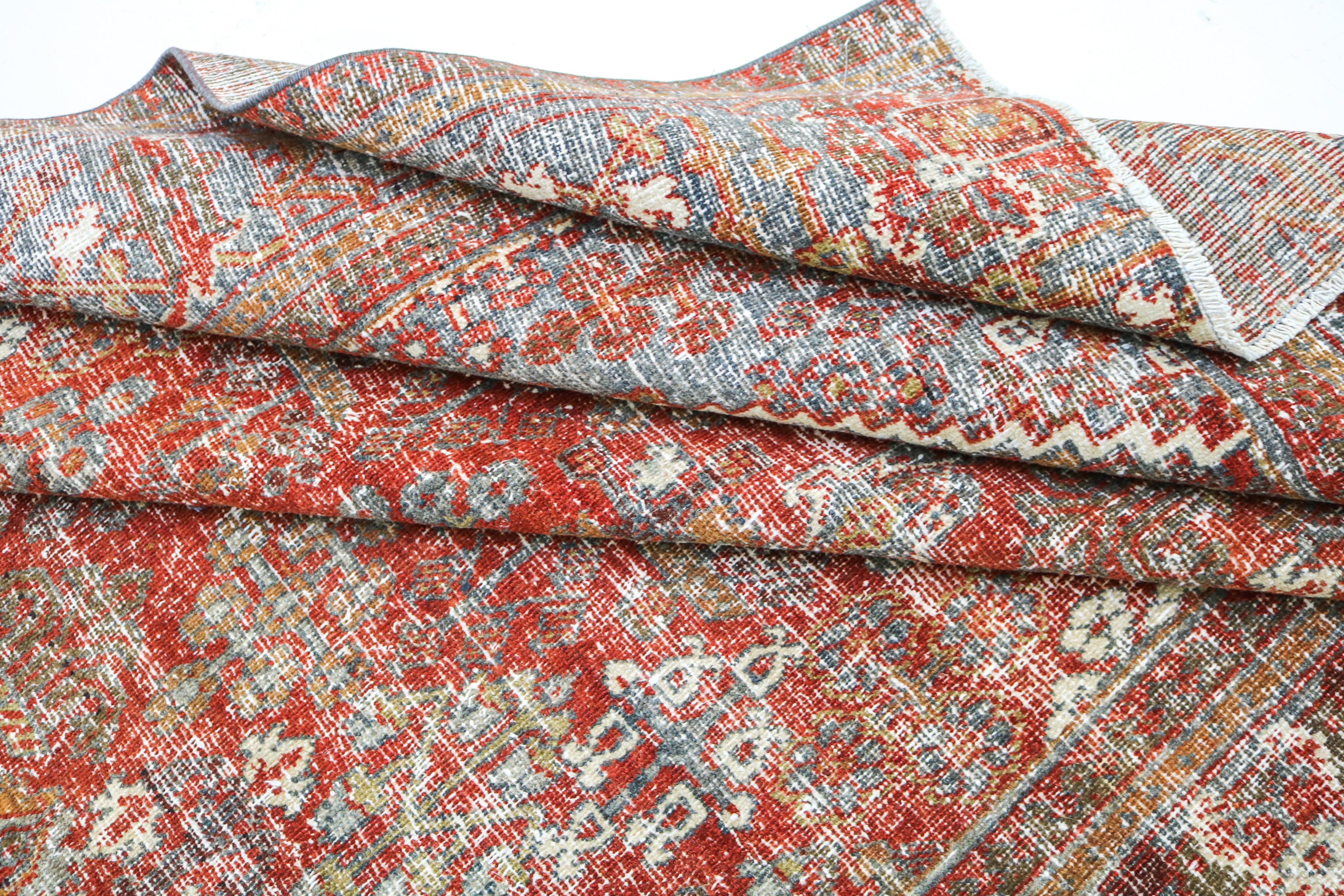 Handwoven Persian Josheqan rug detail with refined village drawing and naturally aged character