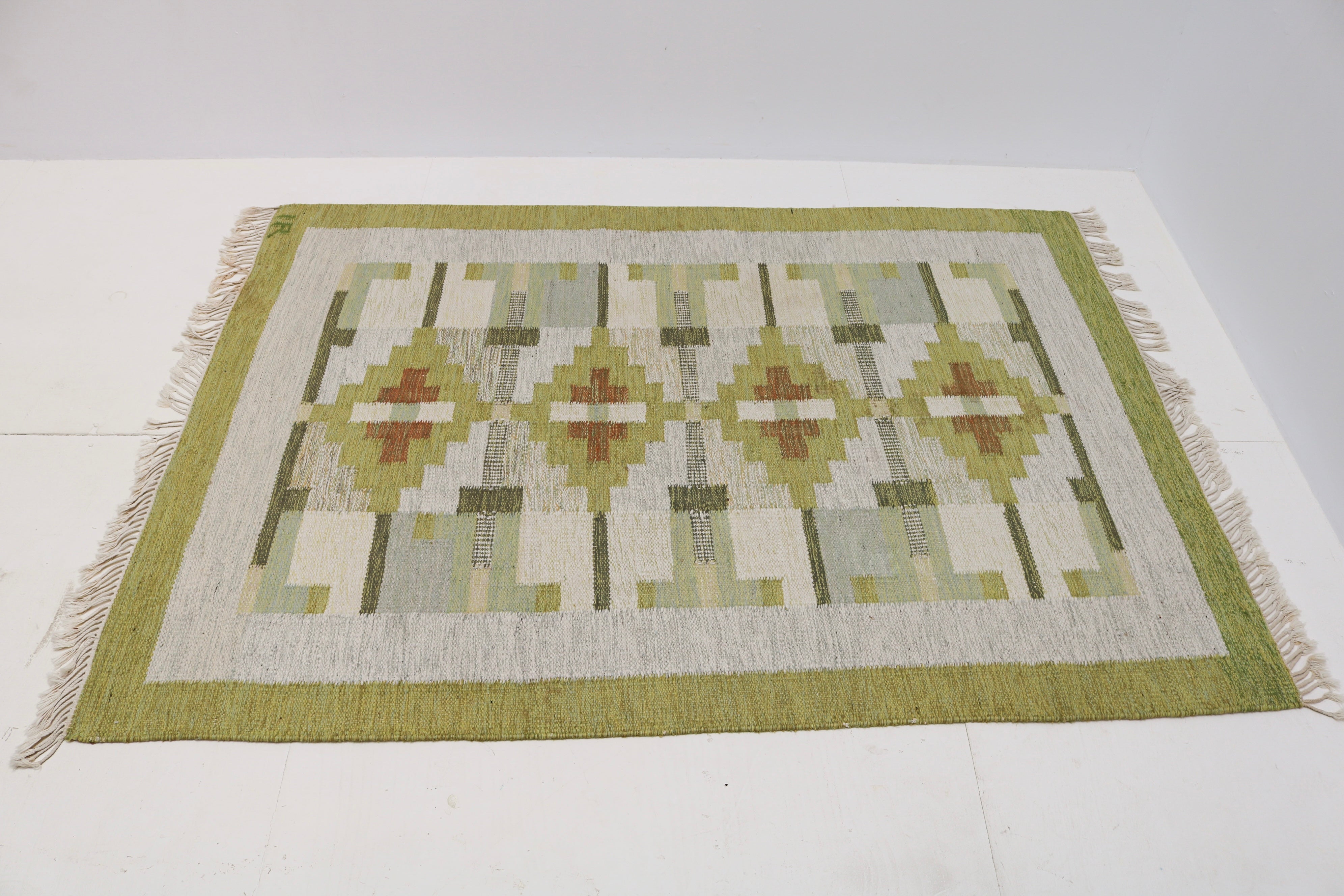 Handwoven Swedish flatweave rug with mid-century geometric pattern