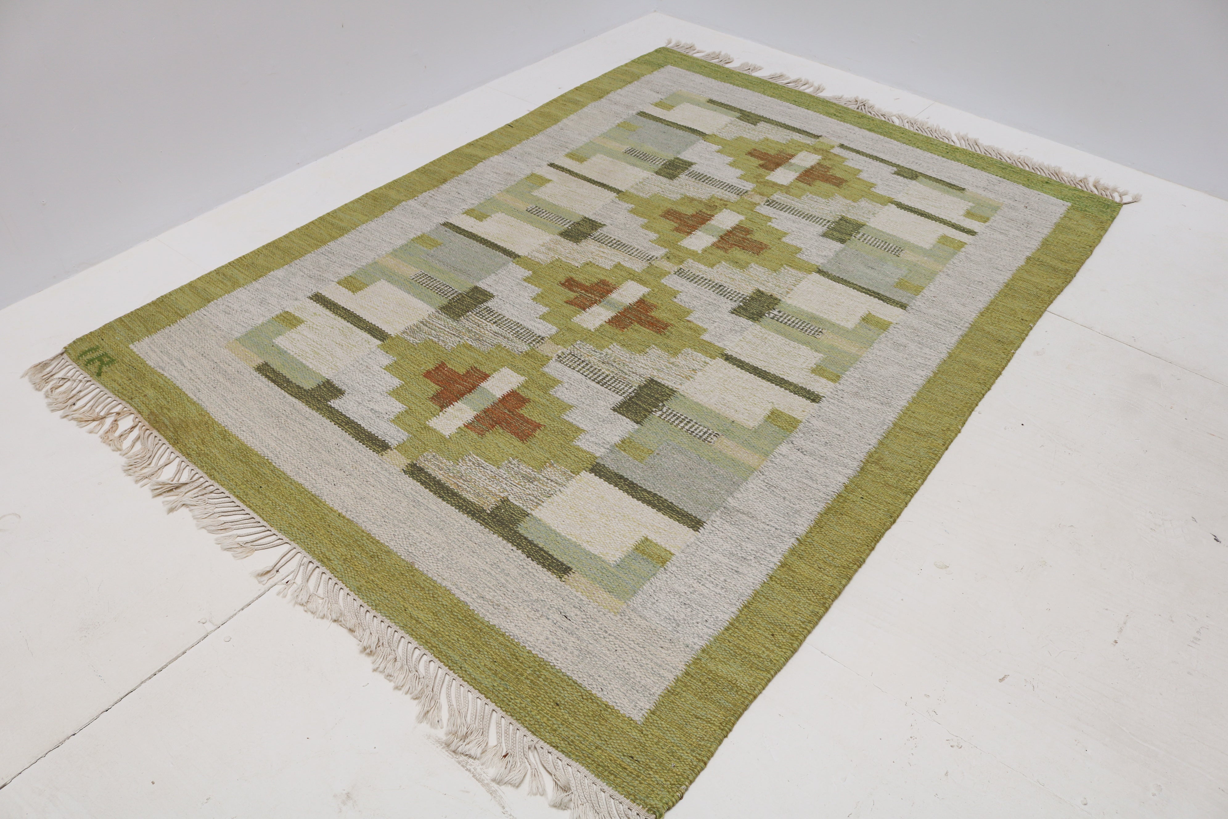 Vintage Swedish wool kilim 231 × 169 cm with soft green geometric design