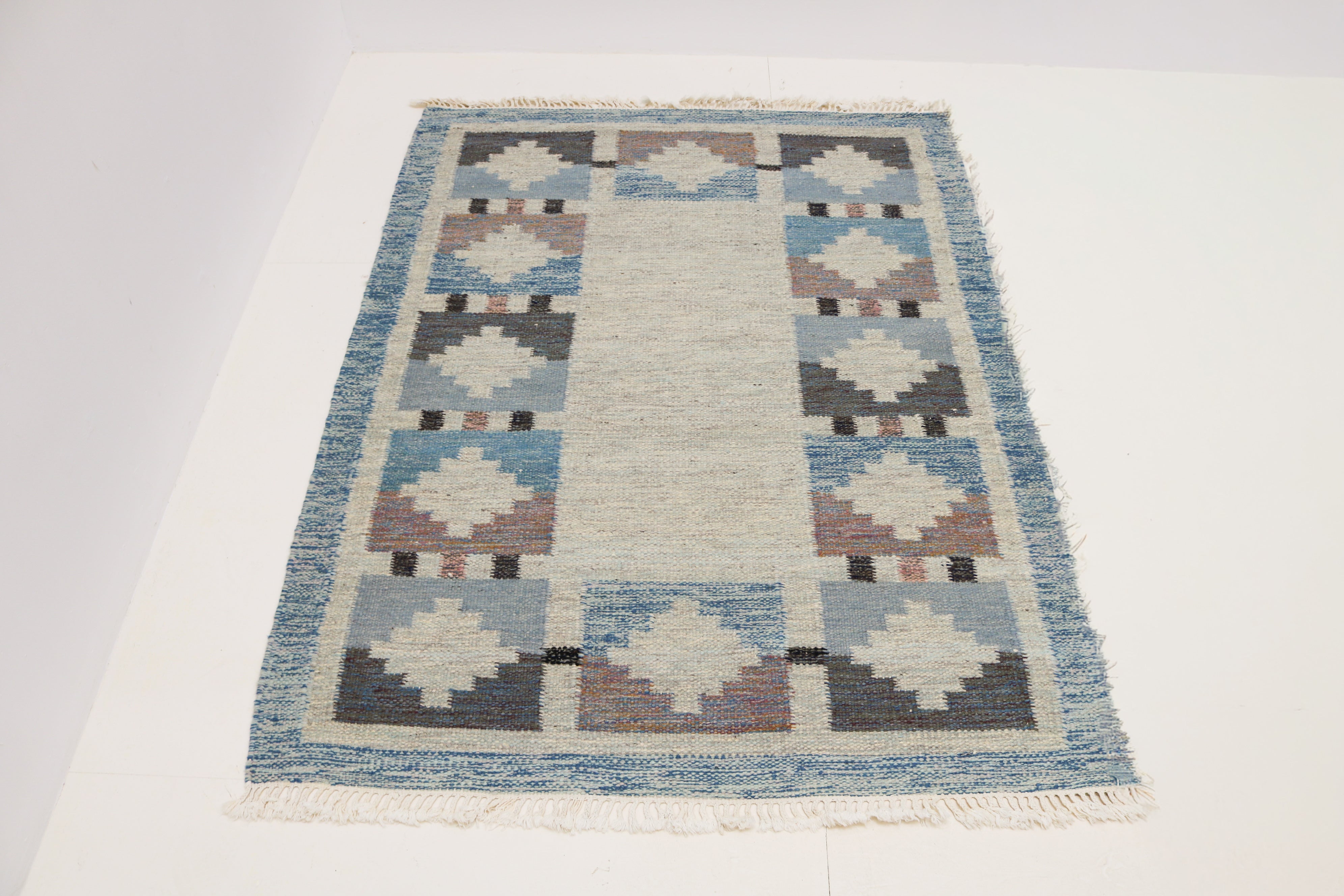 Vintage Swedish kilim rug 190 × 140 cm in soft blue and ivory