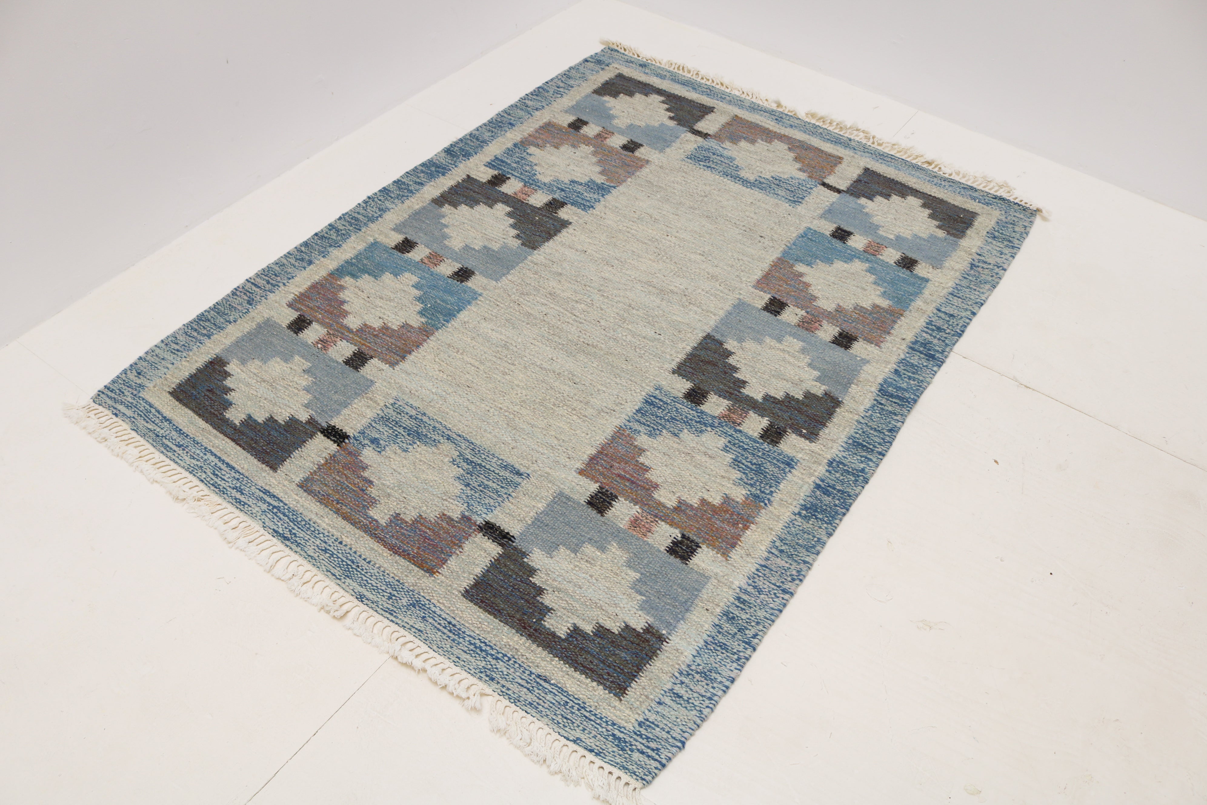 Vintage Swedish wool kilim with muted blue geometric design