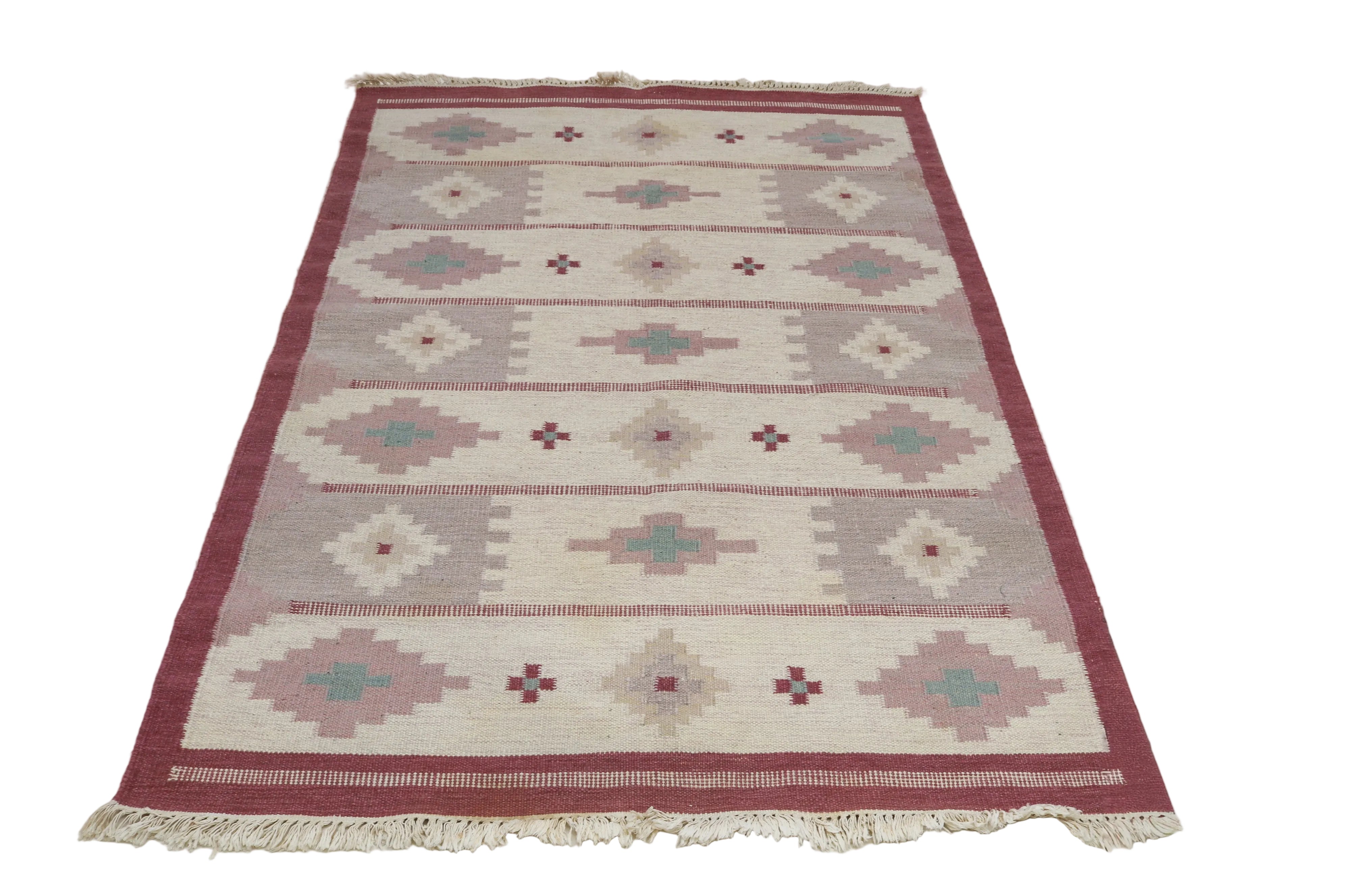 Handwoven vintage Swedish Kilim rug with geometric pink cream and blue-green design