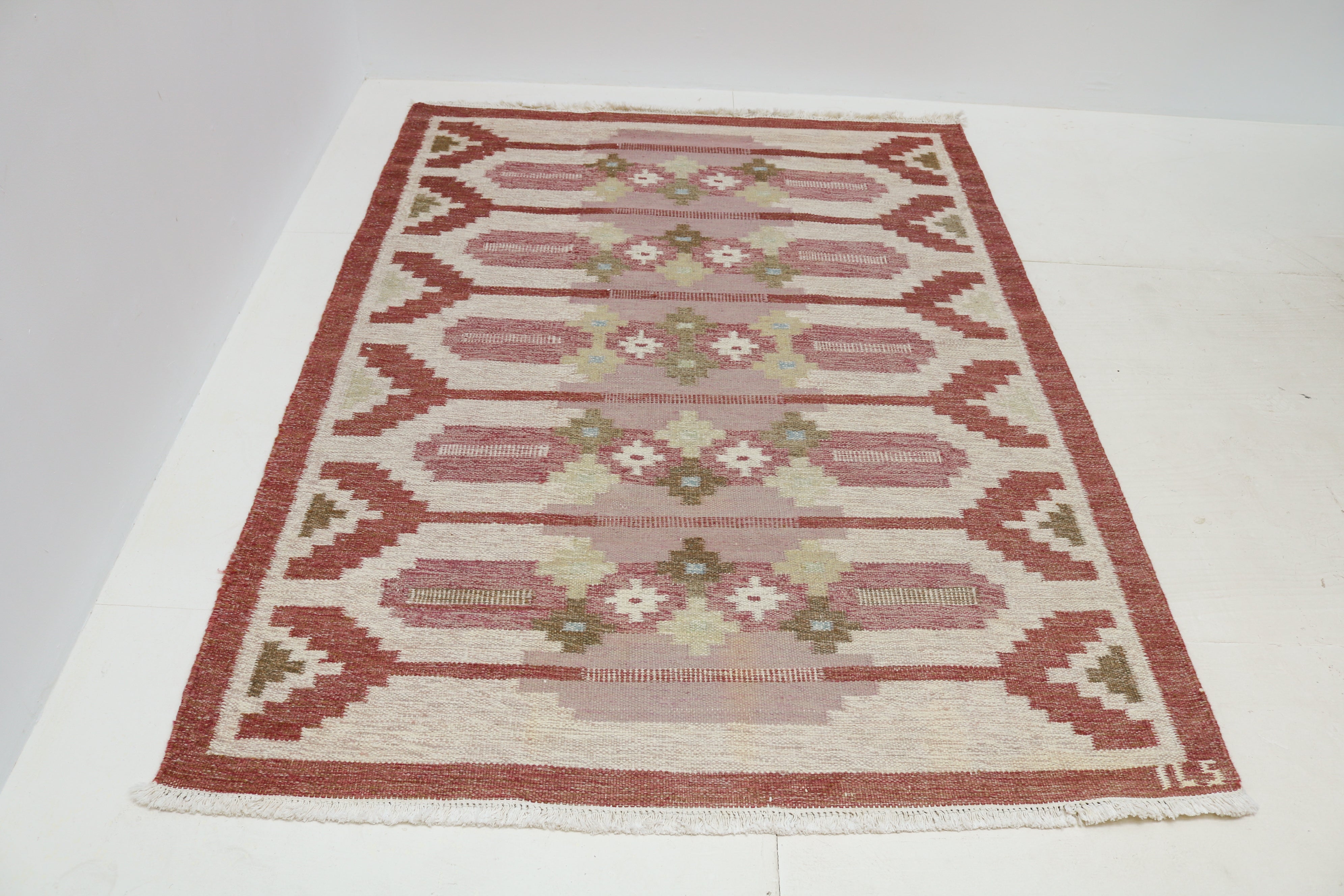 Mid-century vintage Swedish flatweave rug with soft pink, ivory, green and brown geometric motifs
