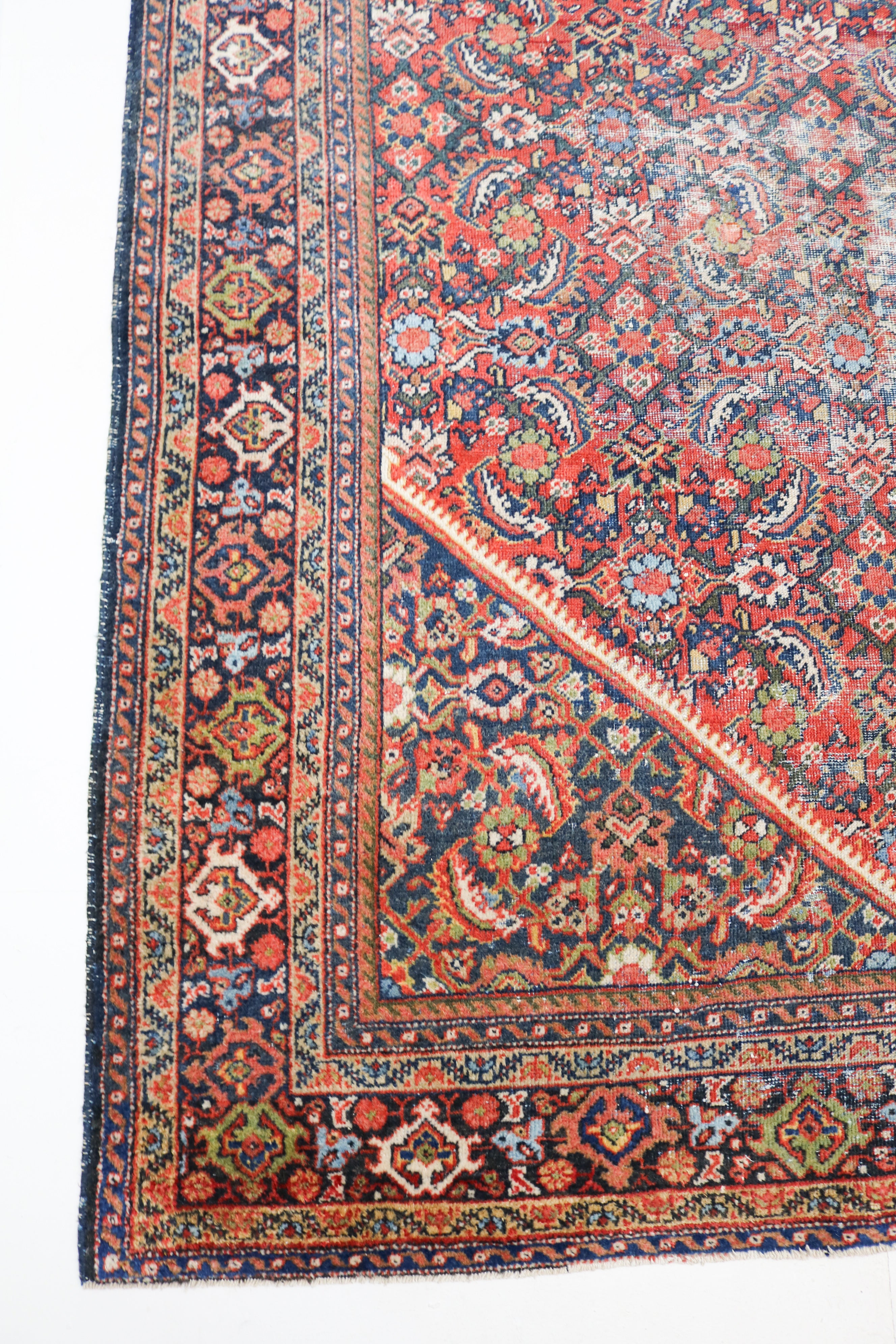 Antique Persian Mahal rug circa 1920, 380 × 278 cm, with terracotta red field and intricate all-over floral design