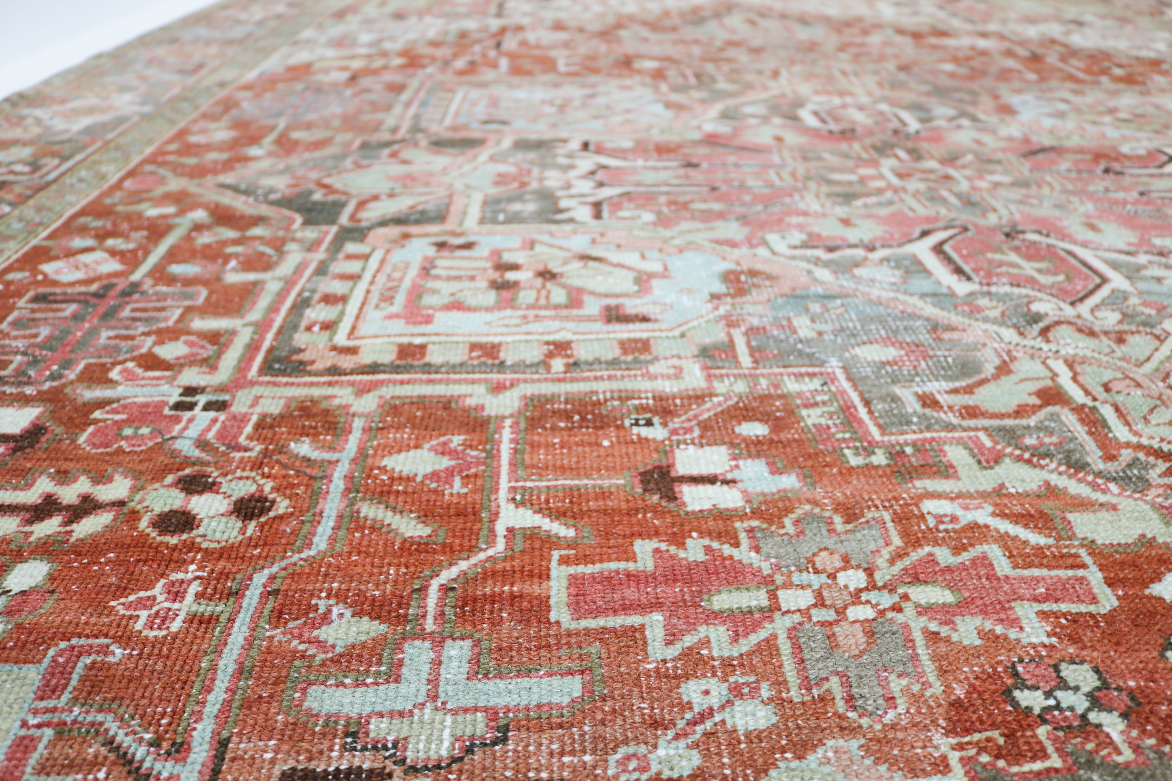 Antique Persian Heriz rug 340 × 240 cm, hand-knotted in wool, circa 1920