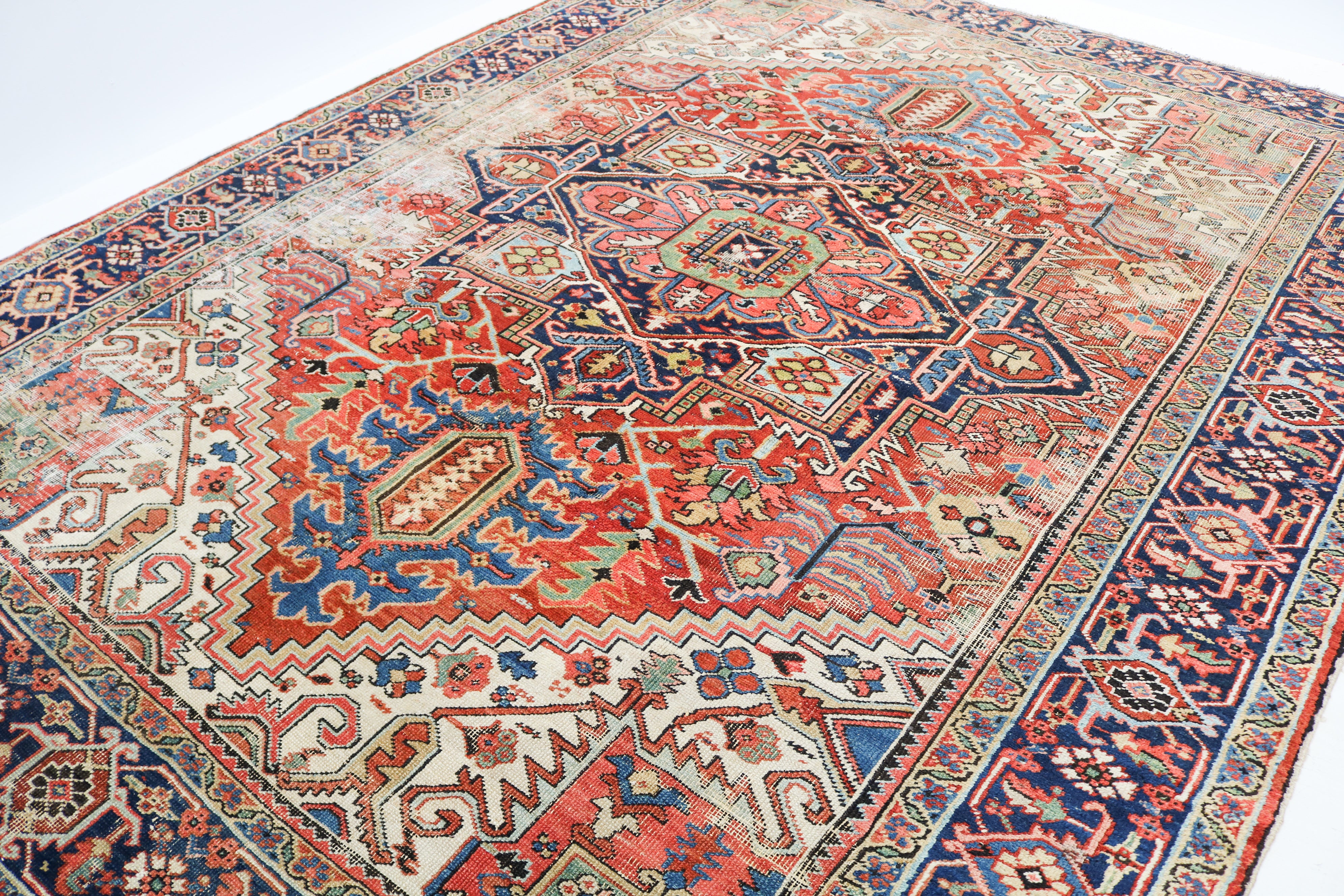 Antique Persian Heriz rug 335 × 266 cm, hand-knotted in wool, circa 1910