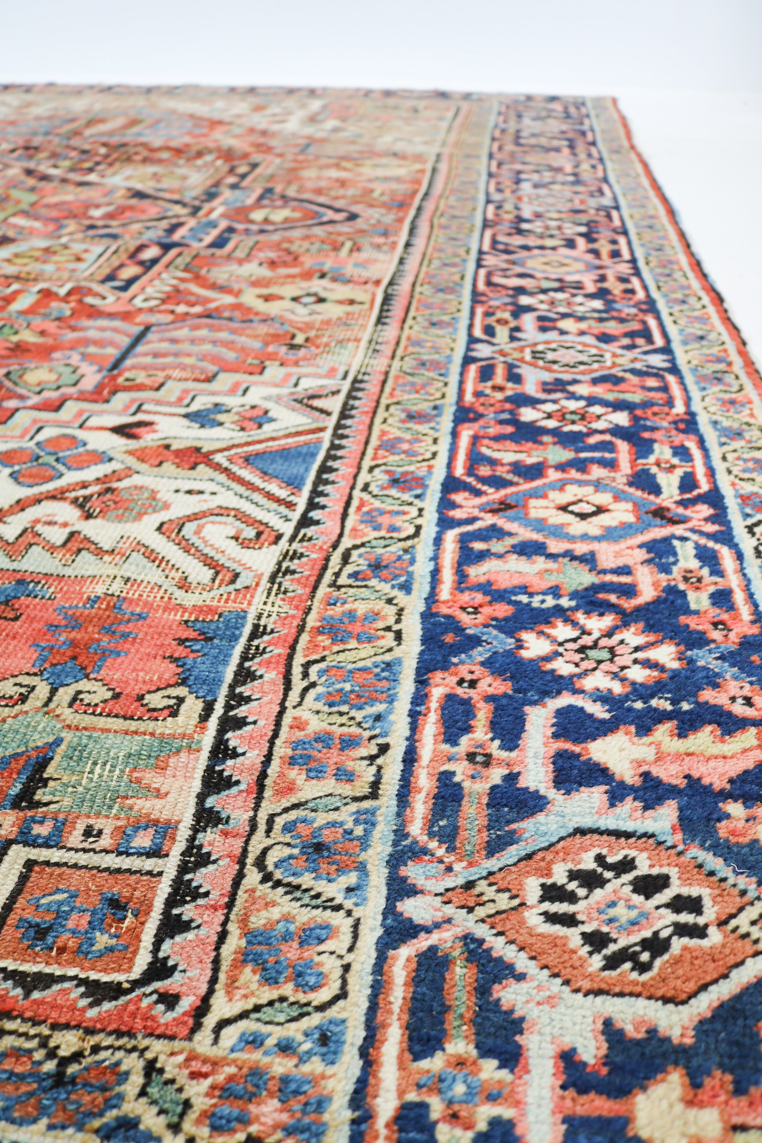 Antique Persian Heriz rug 335 × 266 cm, hand-knotted in wool, circa 1910