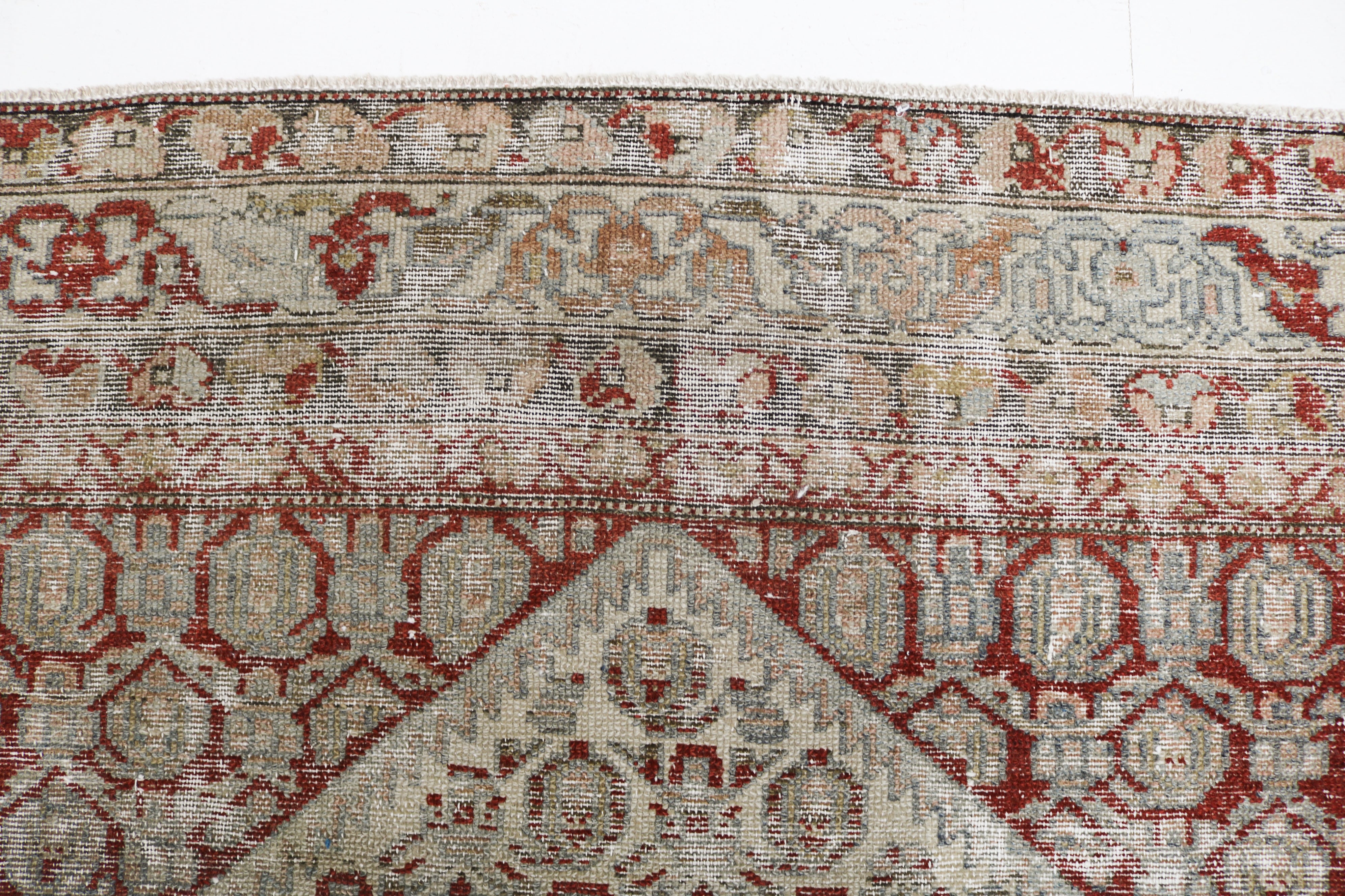 Antique Persian Malayer rug circa 1920, hand-knotted in wool with naturally worn pile and muted colours
