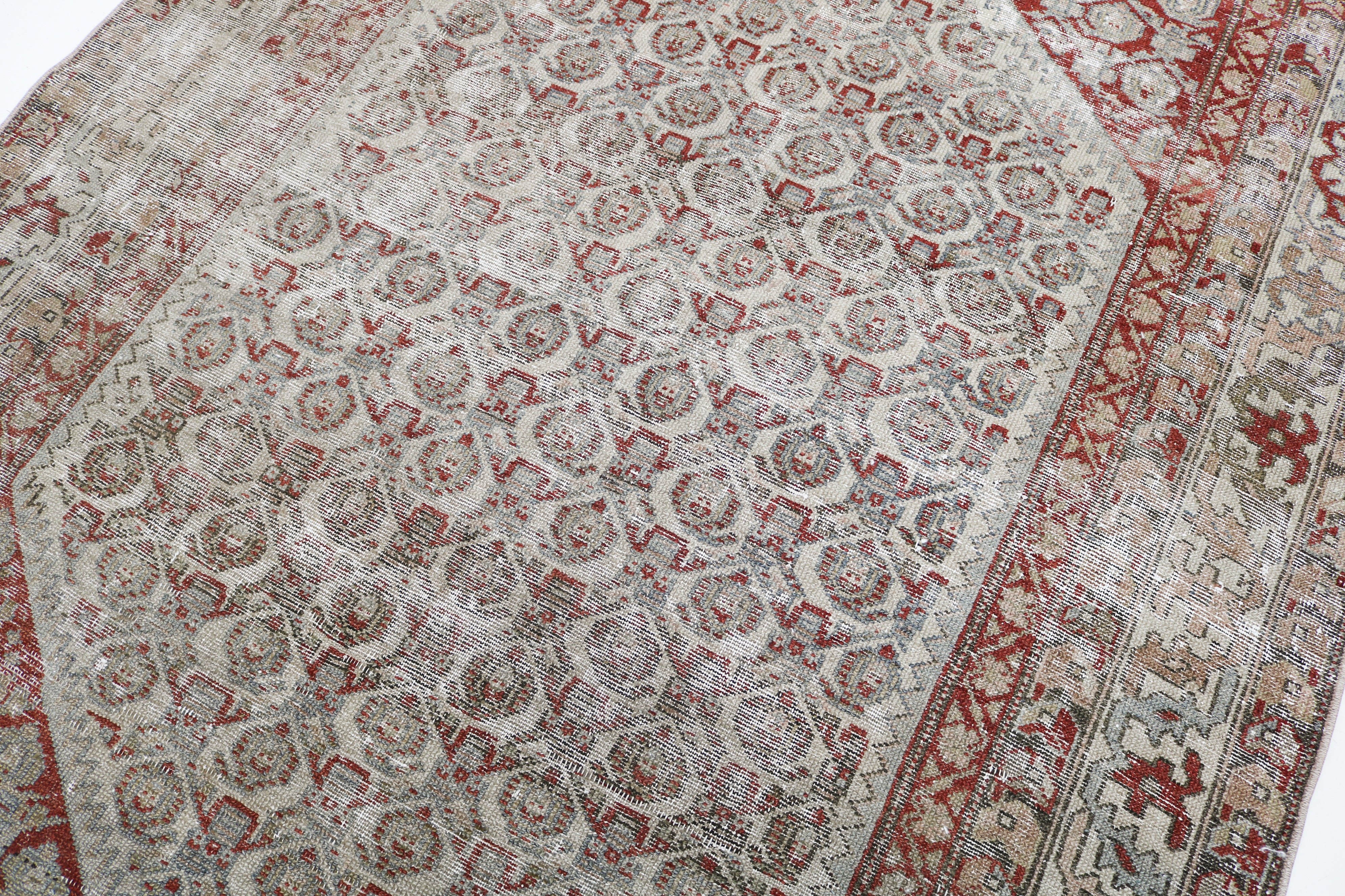 Antique Persian Malayer rug circa 1920, hand-knotted in wool with naturally worn pile and muted colours