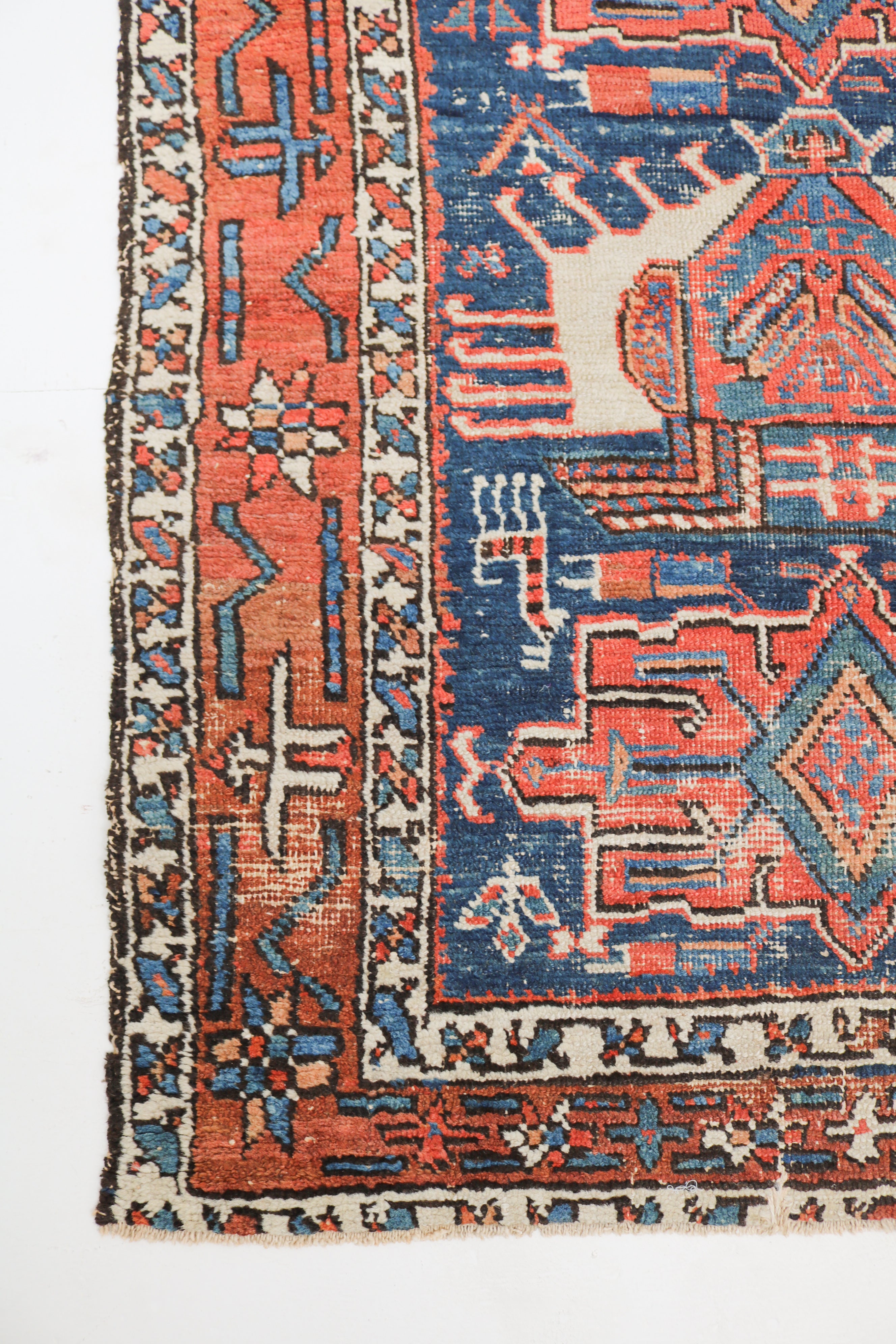 Circa 1900 Persian Bakhshayesh rug with bold indigo, terracotta and ivory geometric pattern