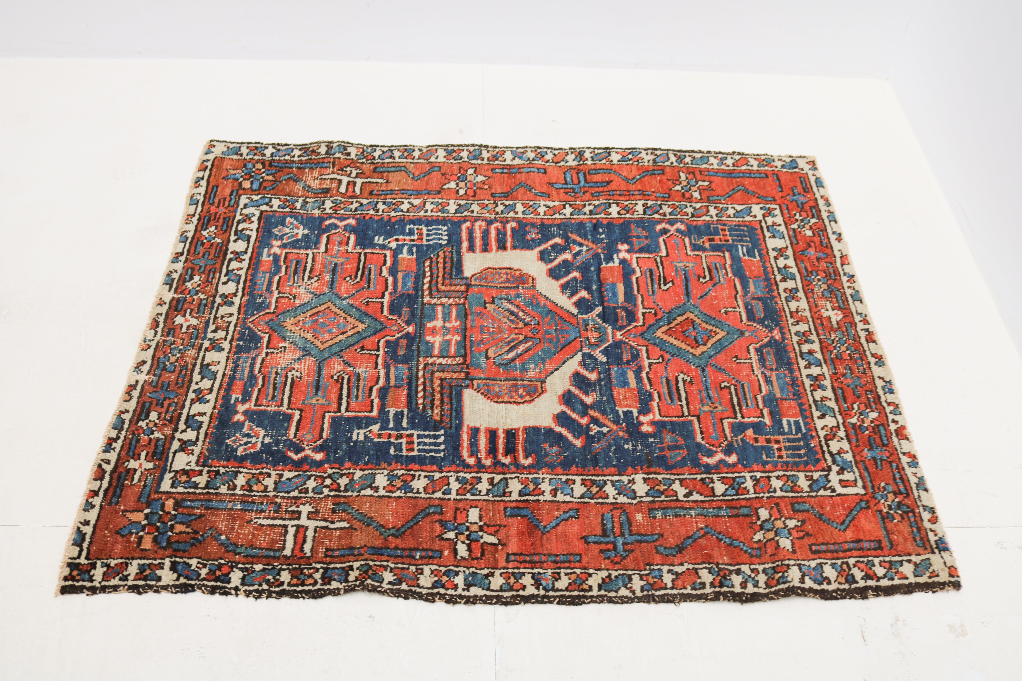 Antique Persian Bakhshayesh rug circa 1900, hand-knotted in wool with geometric design and naturally aged character