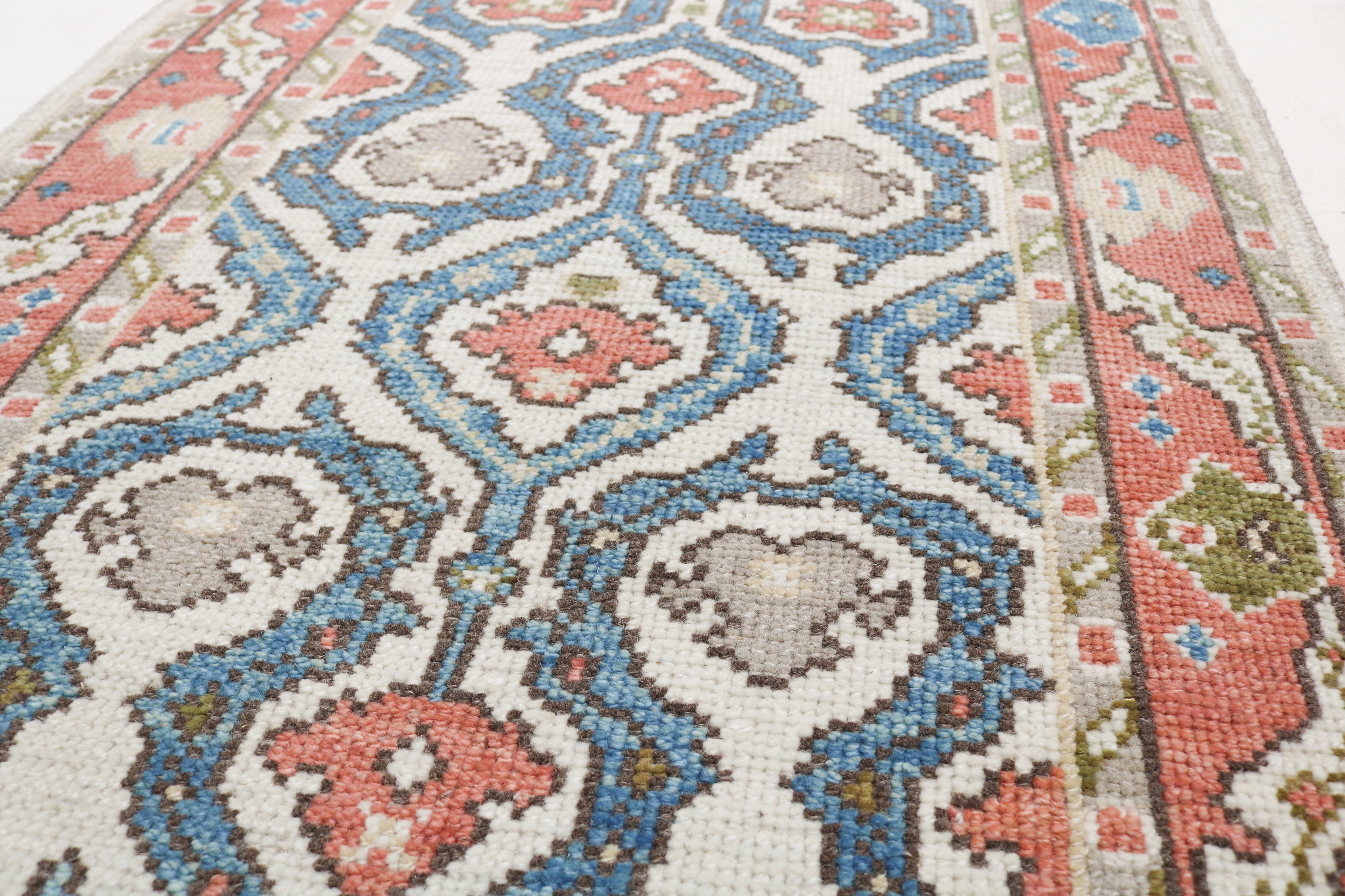 Vintage Turkish Ushak runner 450 × 90 cm hand-knotted in wool with soft muted colours