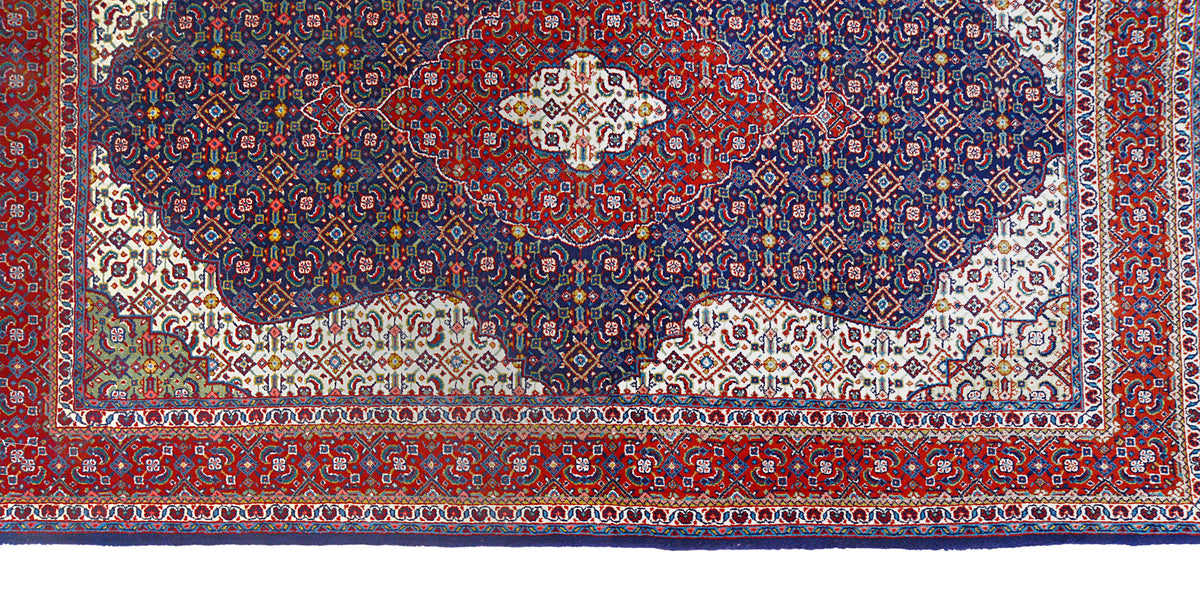 Detailed Persian Sarouk rug field featuring dense patterns and central medallion
