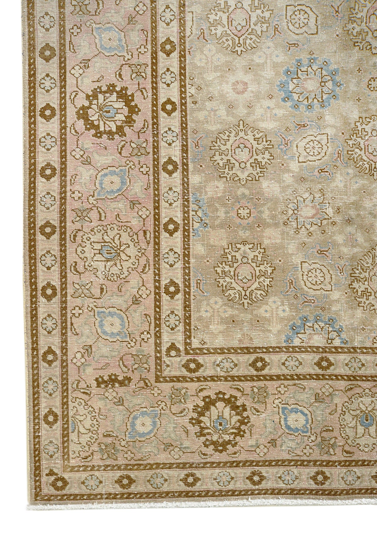 Vintage Persian Tabriz carpet with ivory field, floral motifs and subtle blue accents
