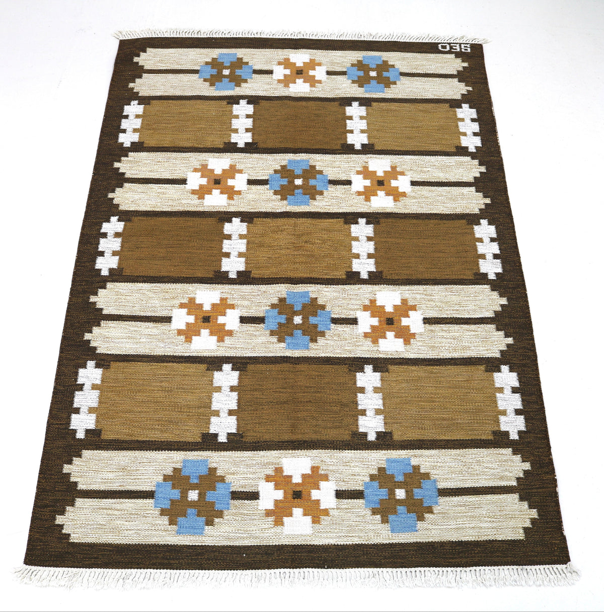 Full view of vintage Swedish Kilim rug with balanced horizontal bands and geometric motifs