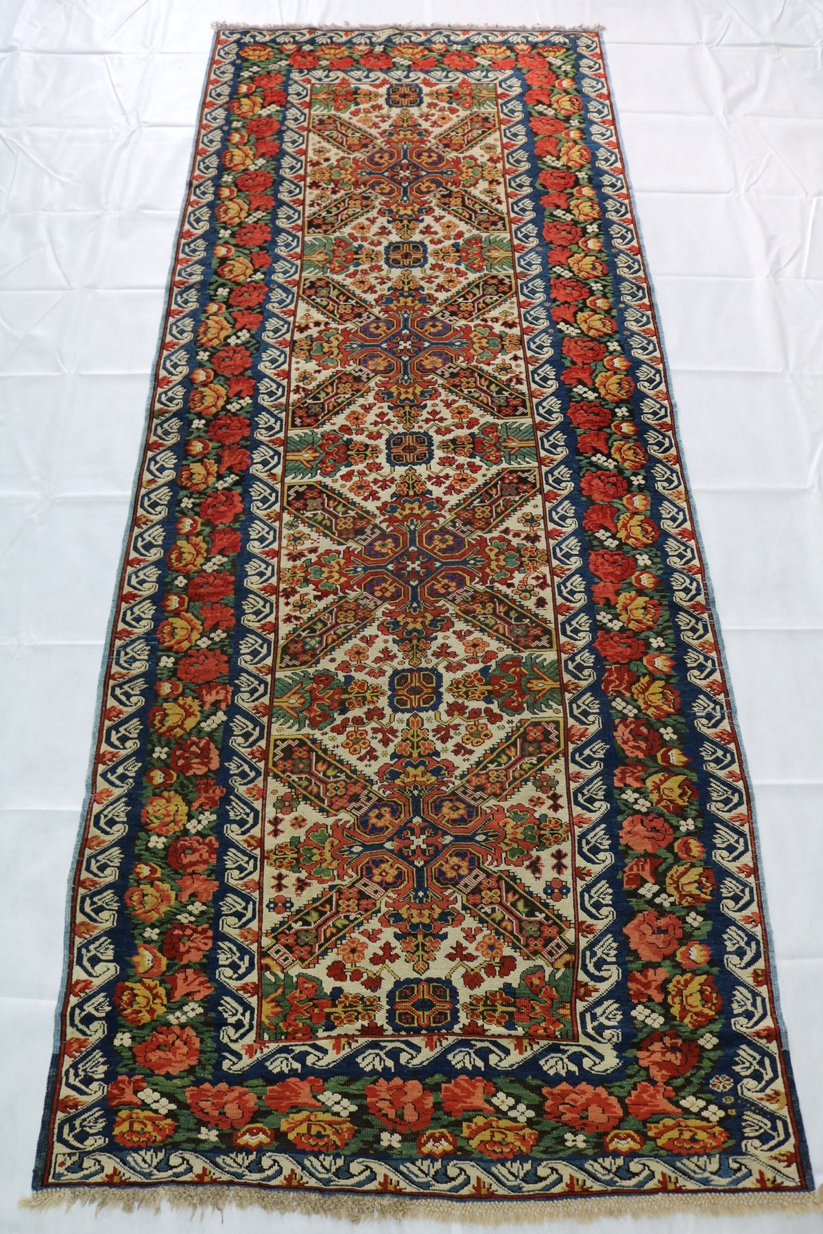 Antique Caucasian Zeichur runner with elongated floral and geometric composition