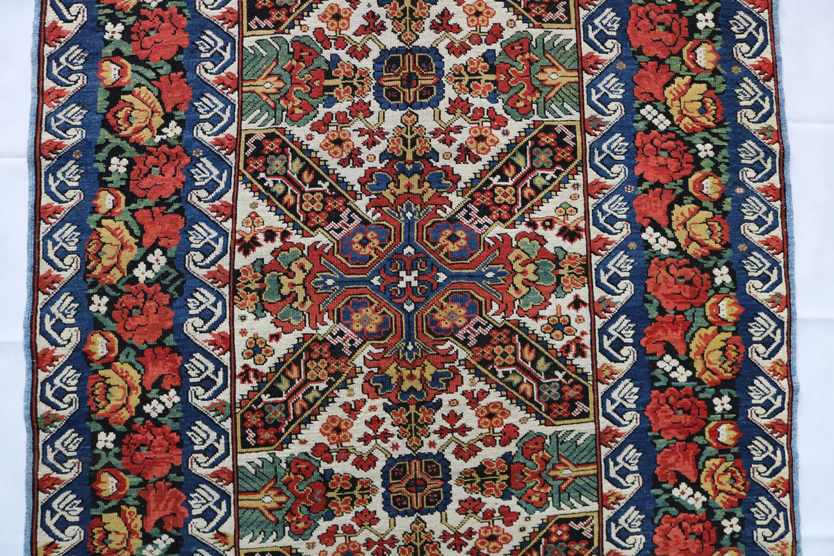 Close-up showing repeated floral motifs and intricate decorative borders