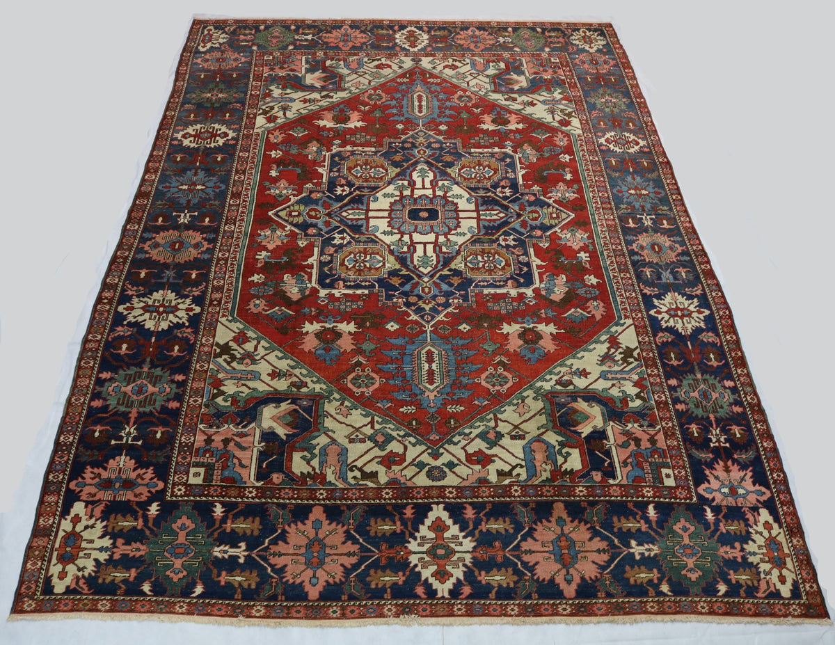 Full view of Heriz Serapi carpet with large stepped central medallion