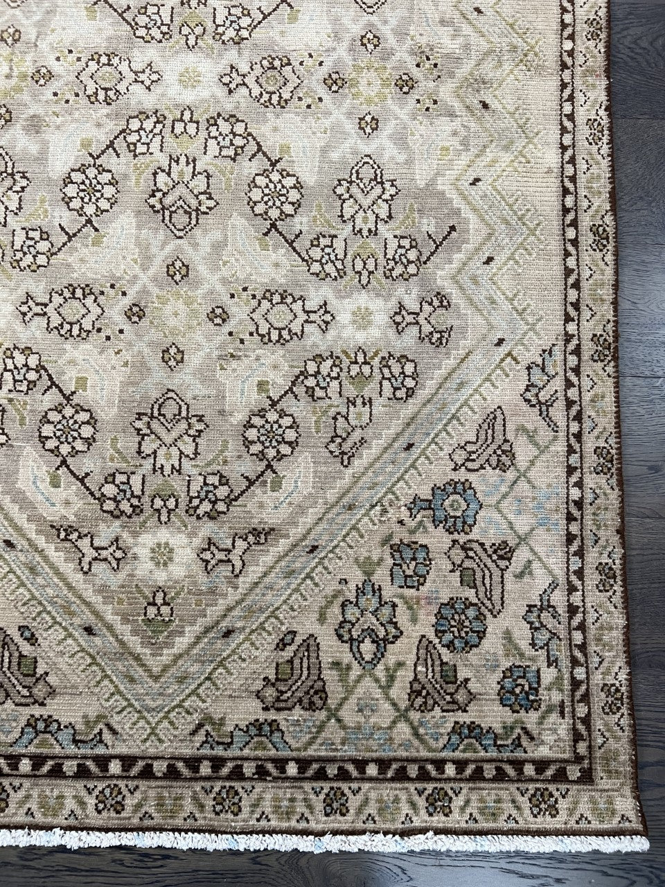 Full rug view highlighting balanced central design and softly muted palette